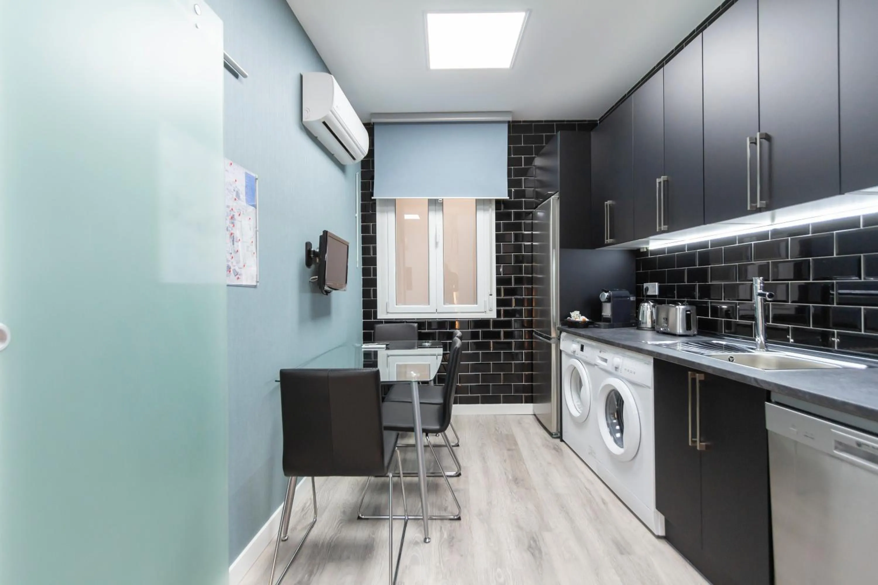 Kitchen or kitchenette in Plaza Mayor Apartment