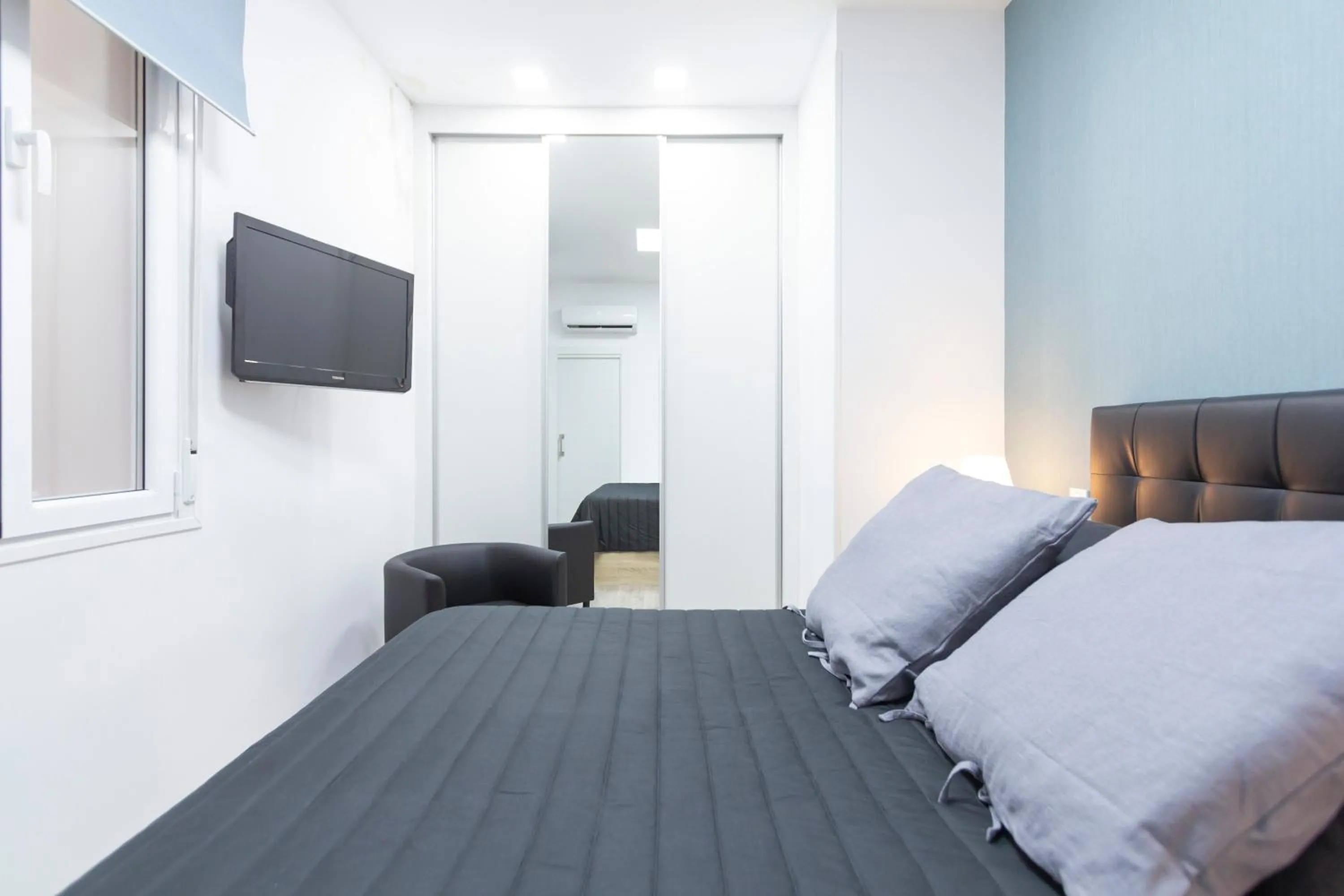Bed in Plaza Mayor Apartment