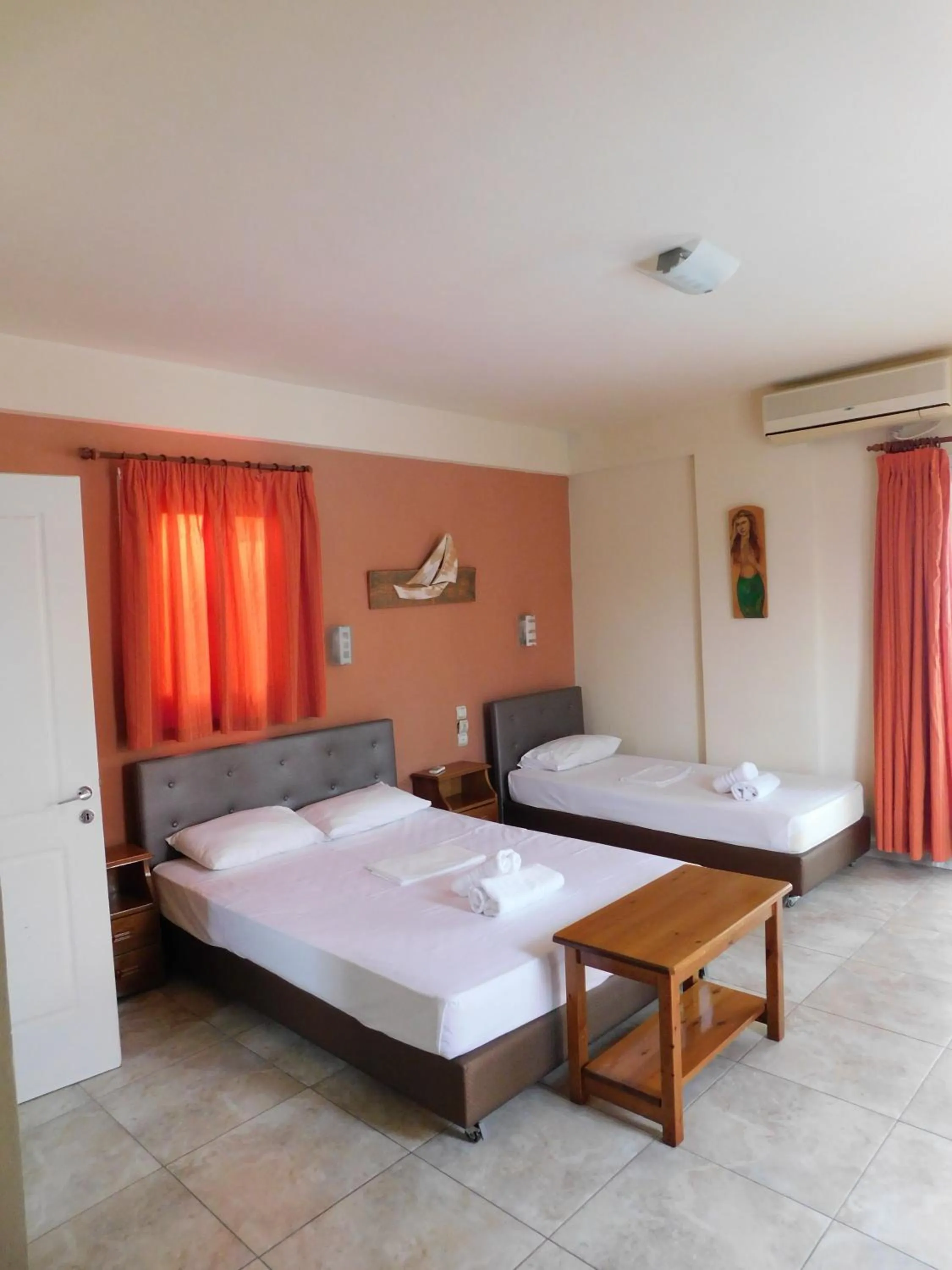 Bed in Aithrio Hotel