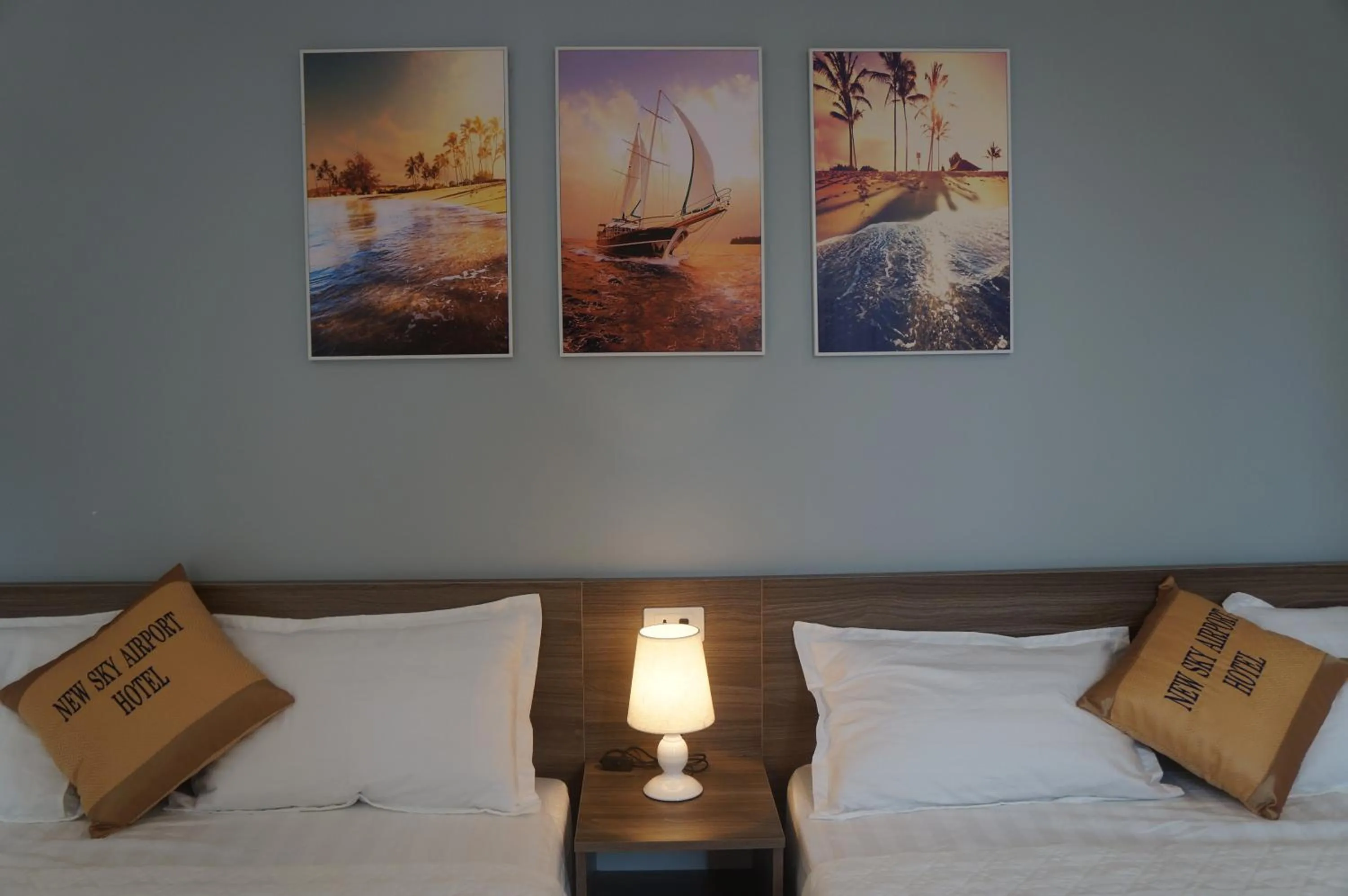 Bed in New Sky Airport Hotel