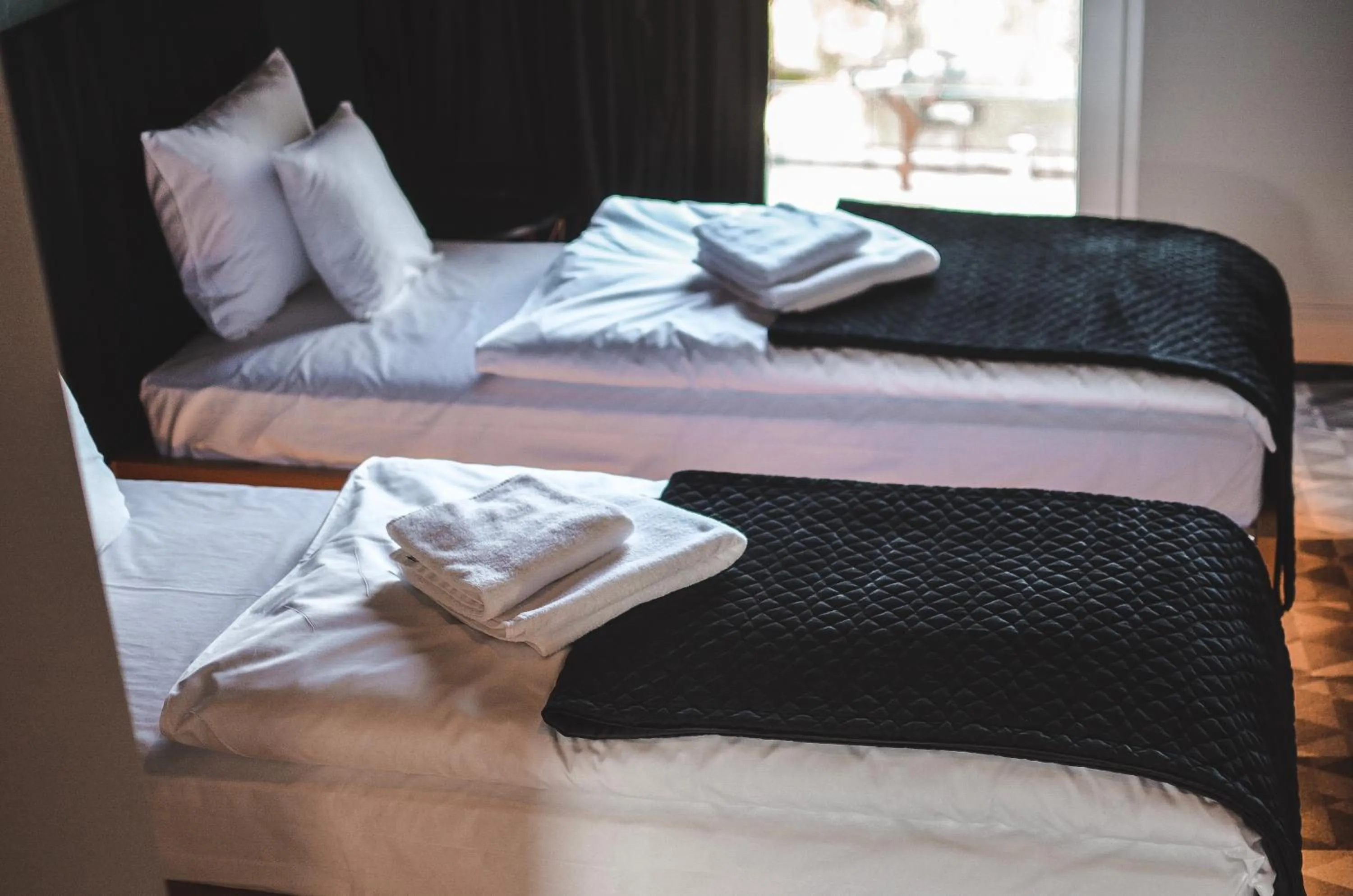 Bed in Sansara Apartments