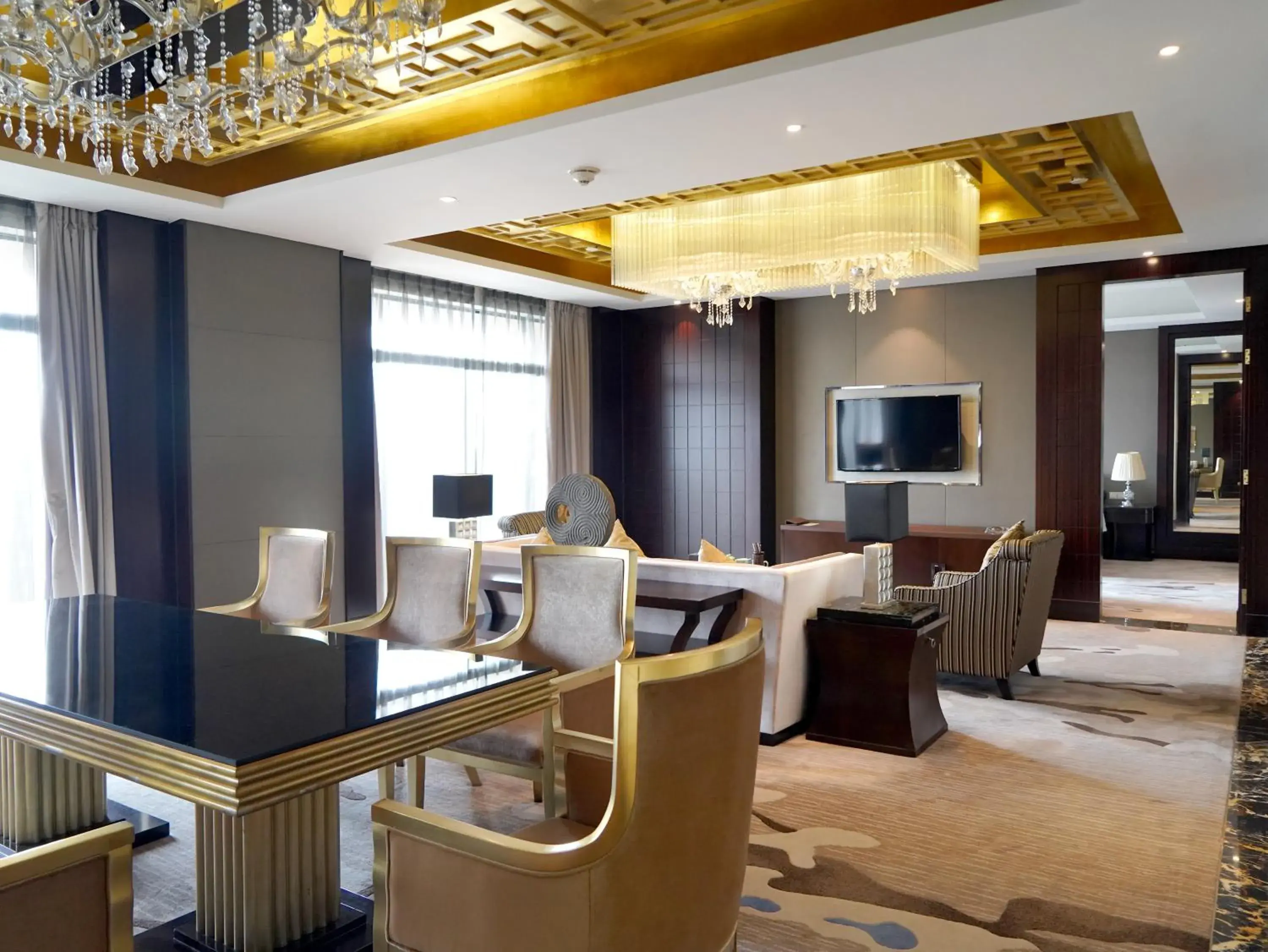 Living room in Howard Johnson Changsheng Plaza Meizhou Living room in Howard Johnson Changsheng Plaza Meizhou