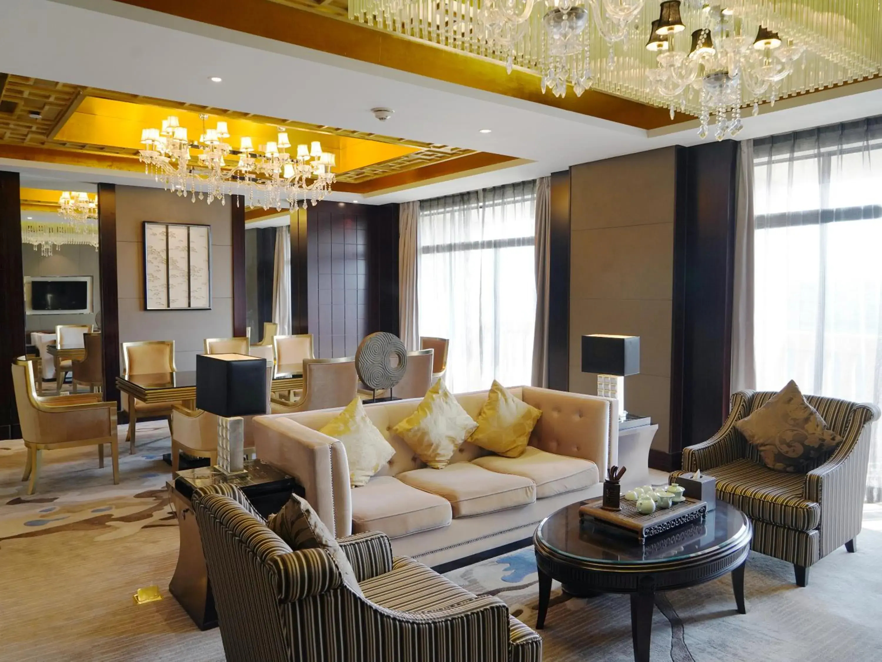 Living room in Howard Johnson Changsheng Plaza Meizhou Living room in Howard Johnson Changsheng Plaza Meizhou