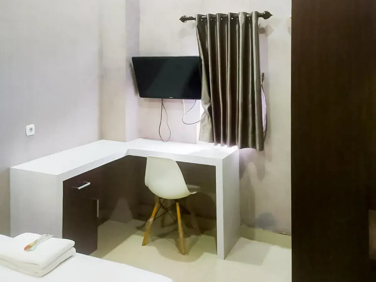 Standard Single Room in RedDoorz Syariah near Sultan Syarif Kasim II Airport Standard Single Room in RedDoorz Syariah near Sultan Syarif Kasim II Airport