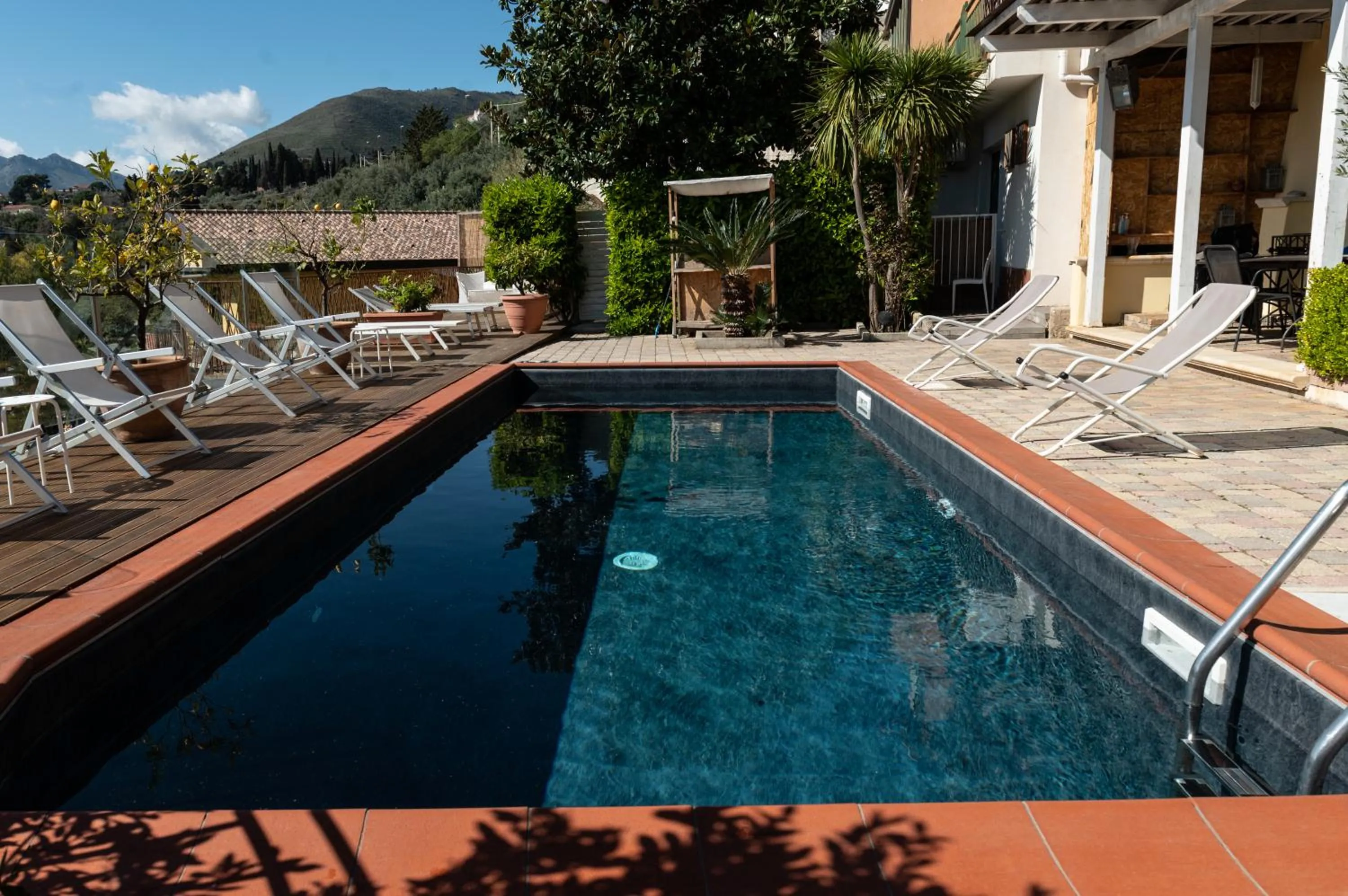 Swimming pool in BnB Casa Rossa
