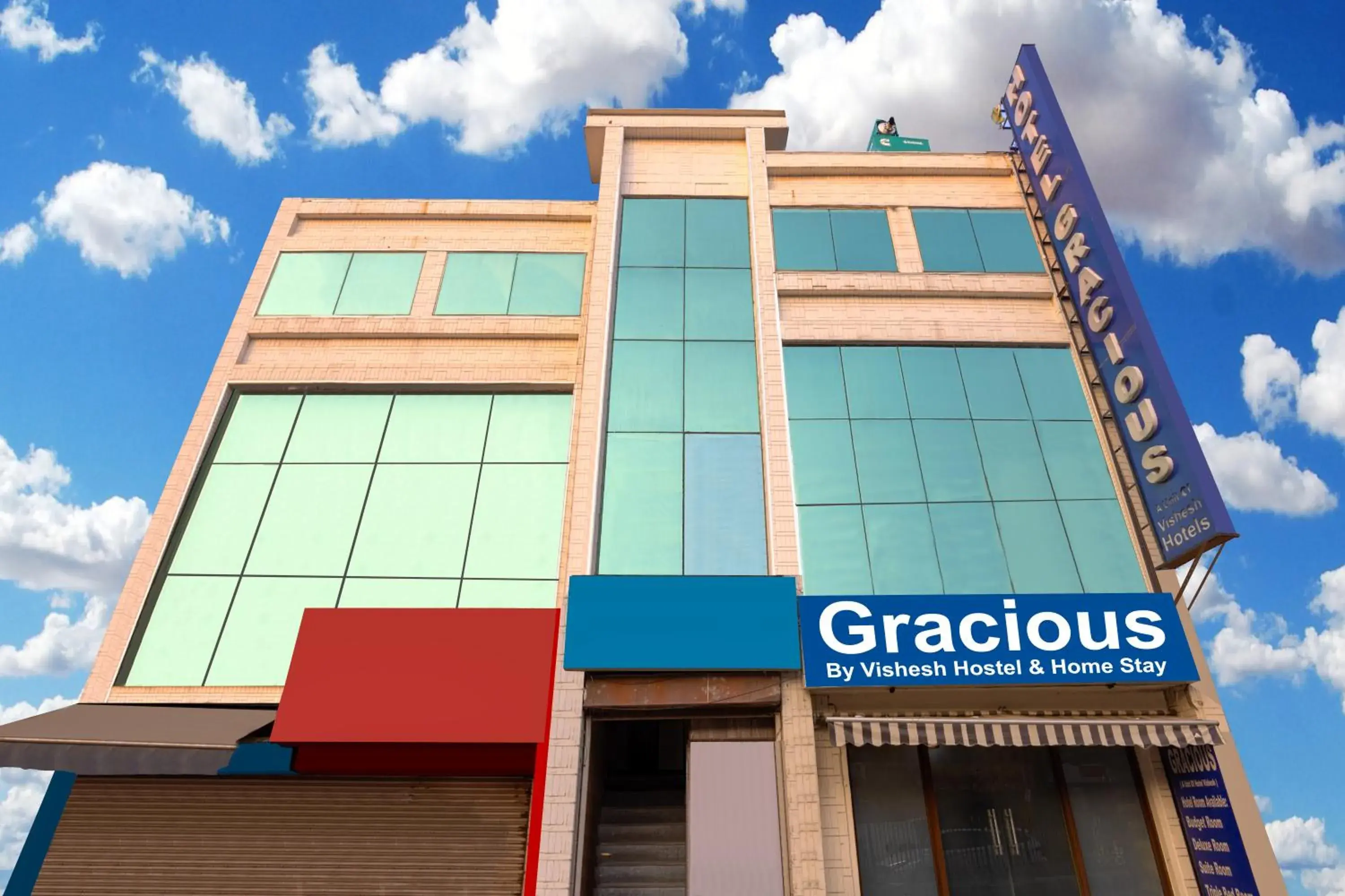 Property building in Gracious by Vishesh Hotels & Home Stay Property building in Gracious by Vishesh Hotels & Home Stay