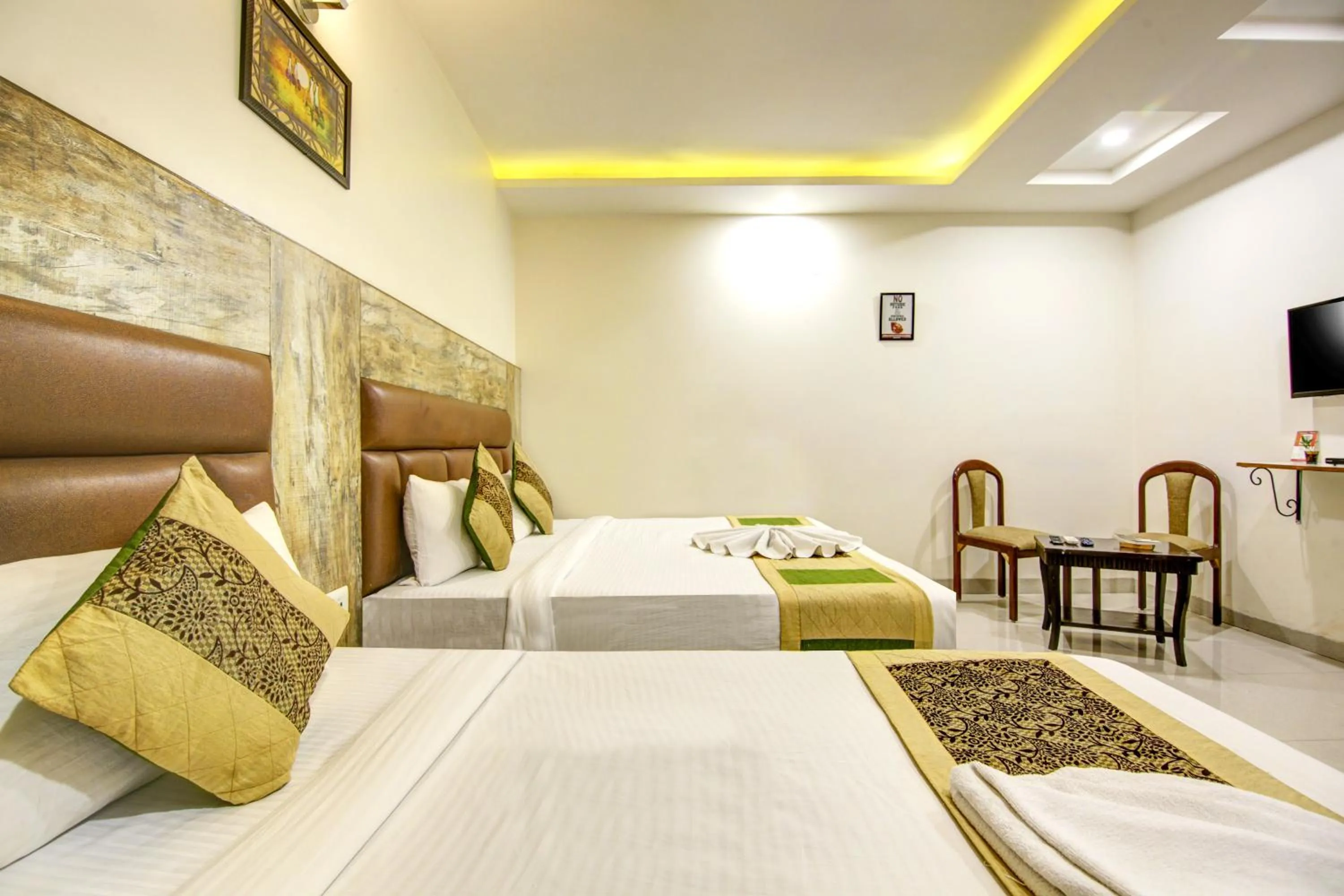 Bedroom, Bed in Gracious by Vishesh Hotels & Home Stay