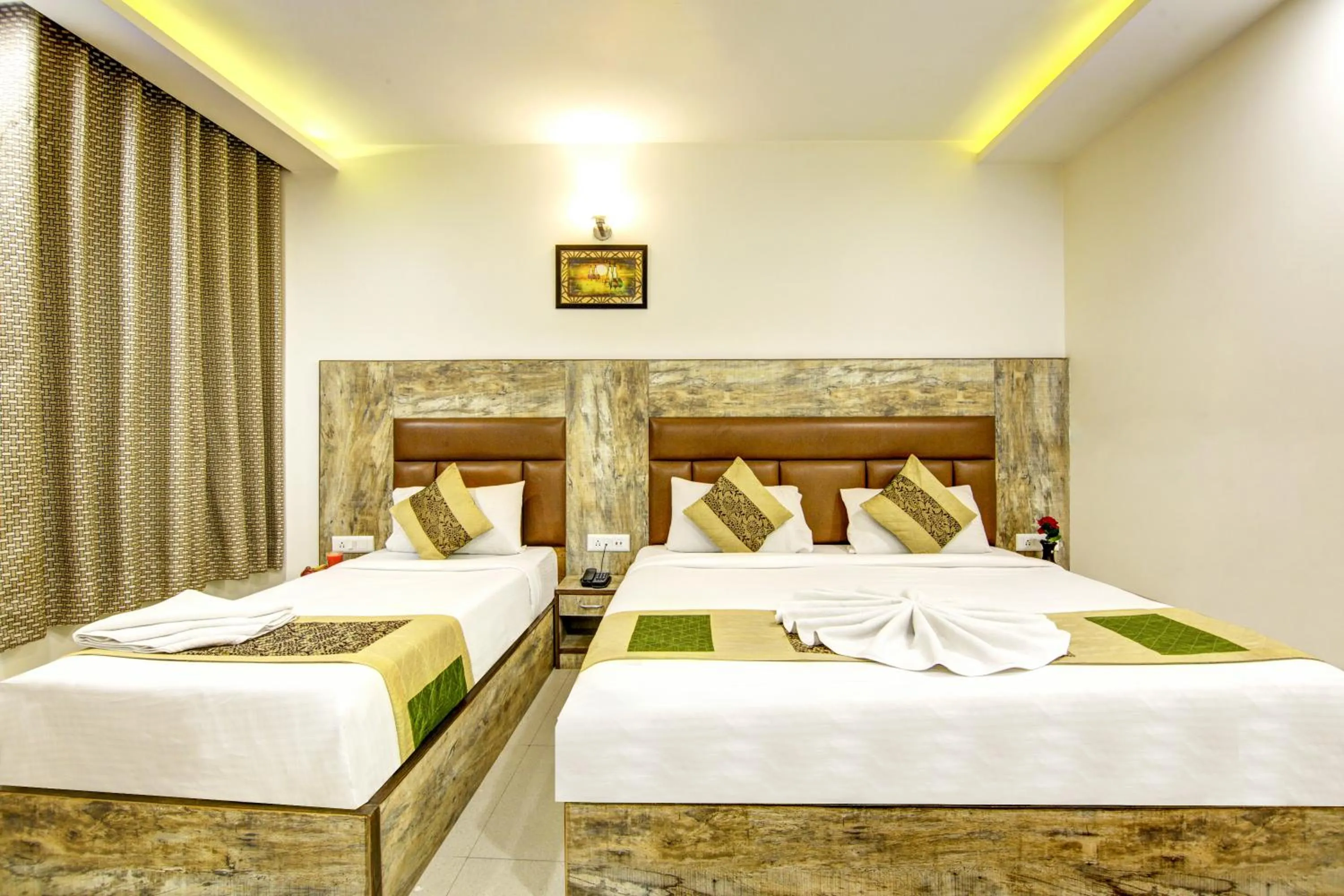 Bed in Gracious by Vishesh Hotels & Home Stay