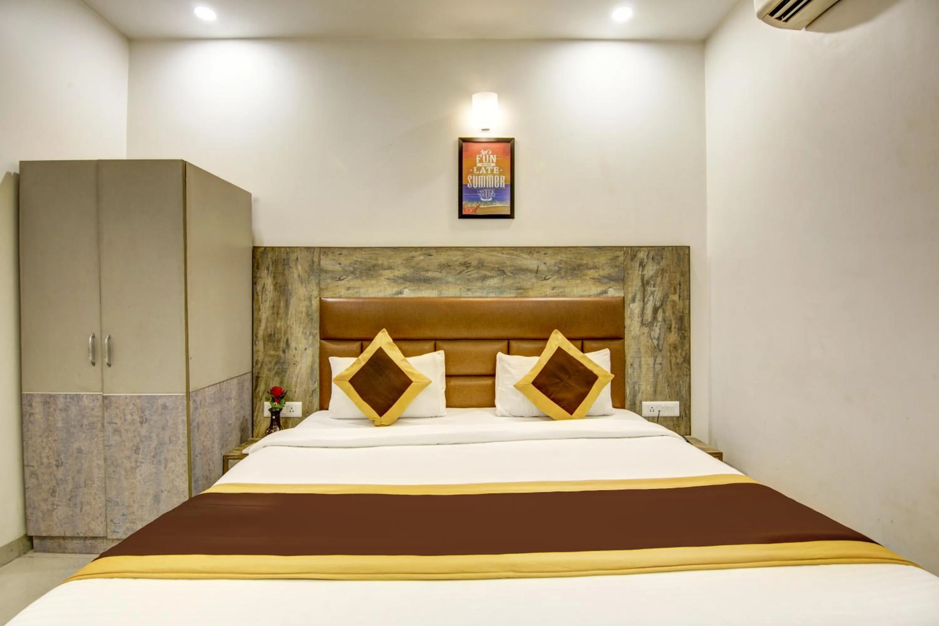 Bedroom, Bed in Gracious by Vishesh Hotels & Home Stay