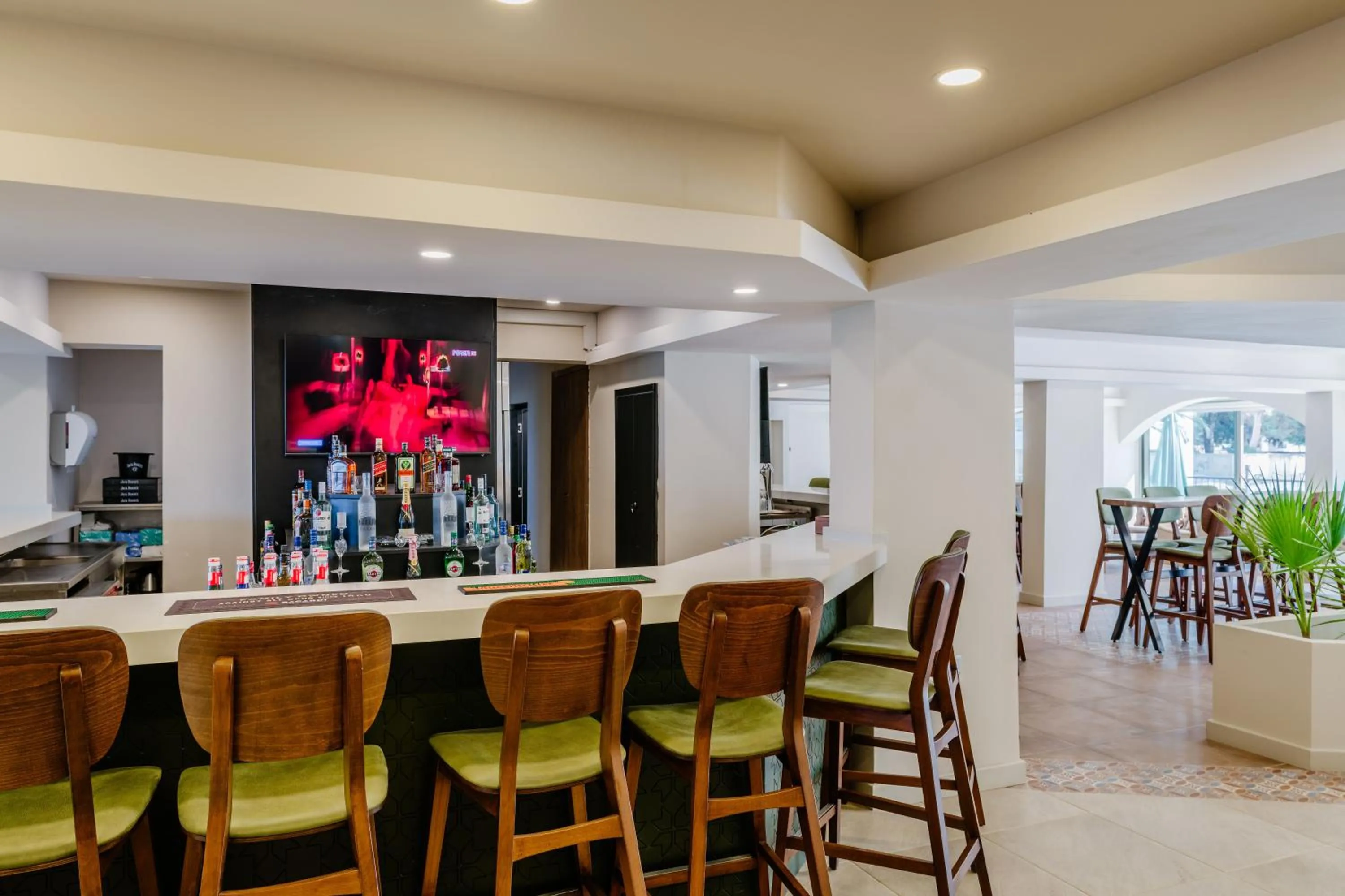 Lounge or bar in Olivia Palm Hotel