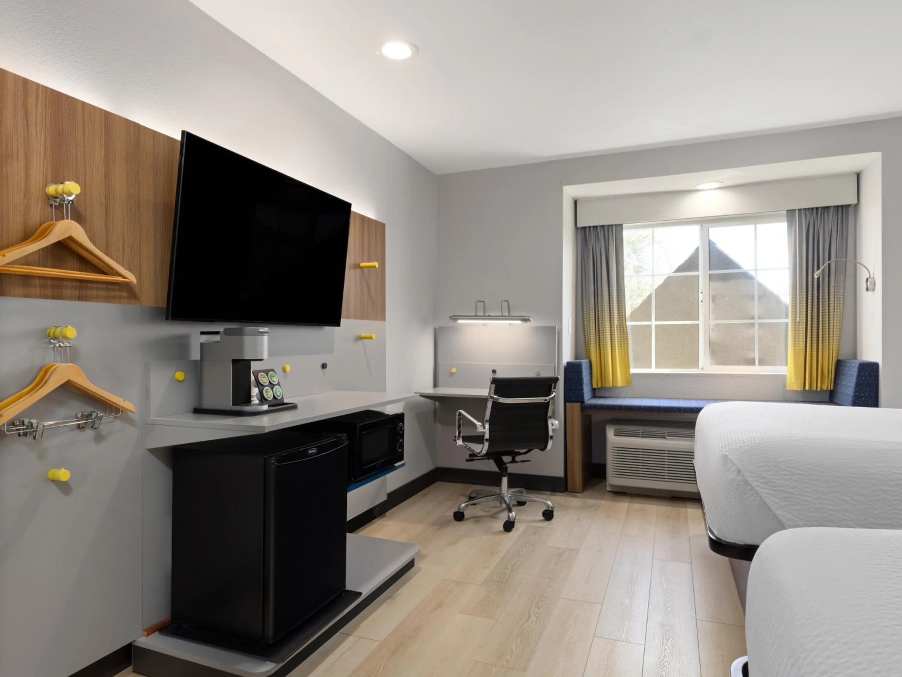 Bed in Microtel Inn & Suites by Wyndham Tracy