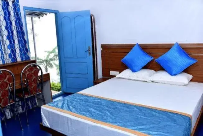 Deluxe Double Room (2 Adults + 1 Child) in Blackcherry Munnar Deluxe Double Room (2 Adults + 1 Child) in Blackcherry Munnar