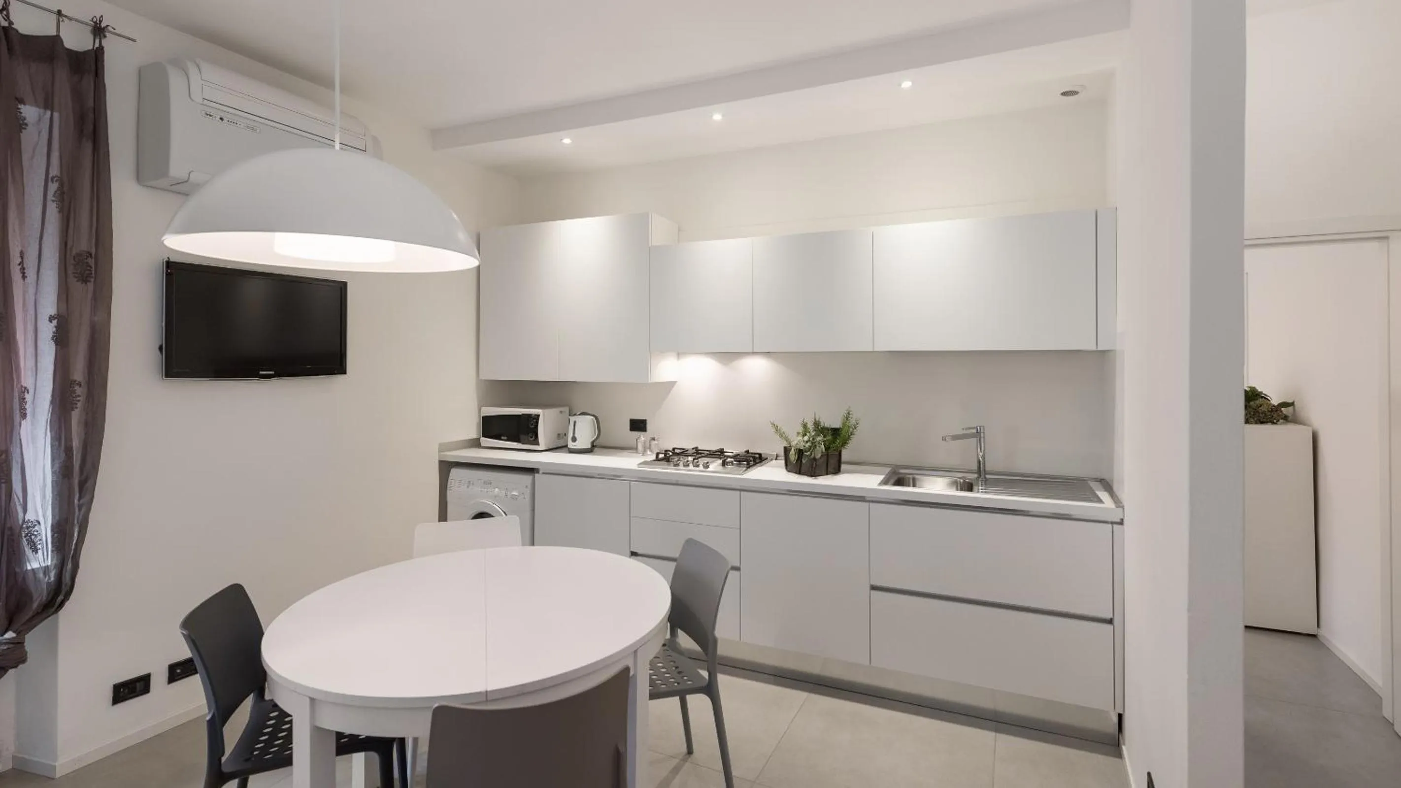 Kitchen or kitchenette in Il Vicolo Aparthotel Verona