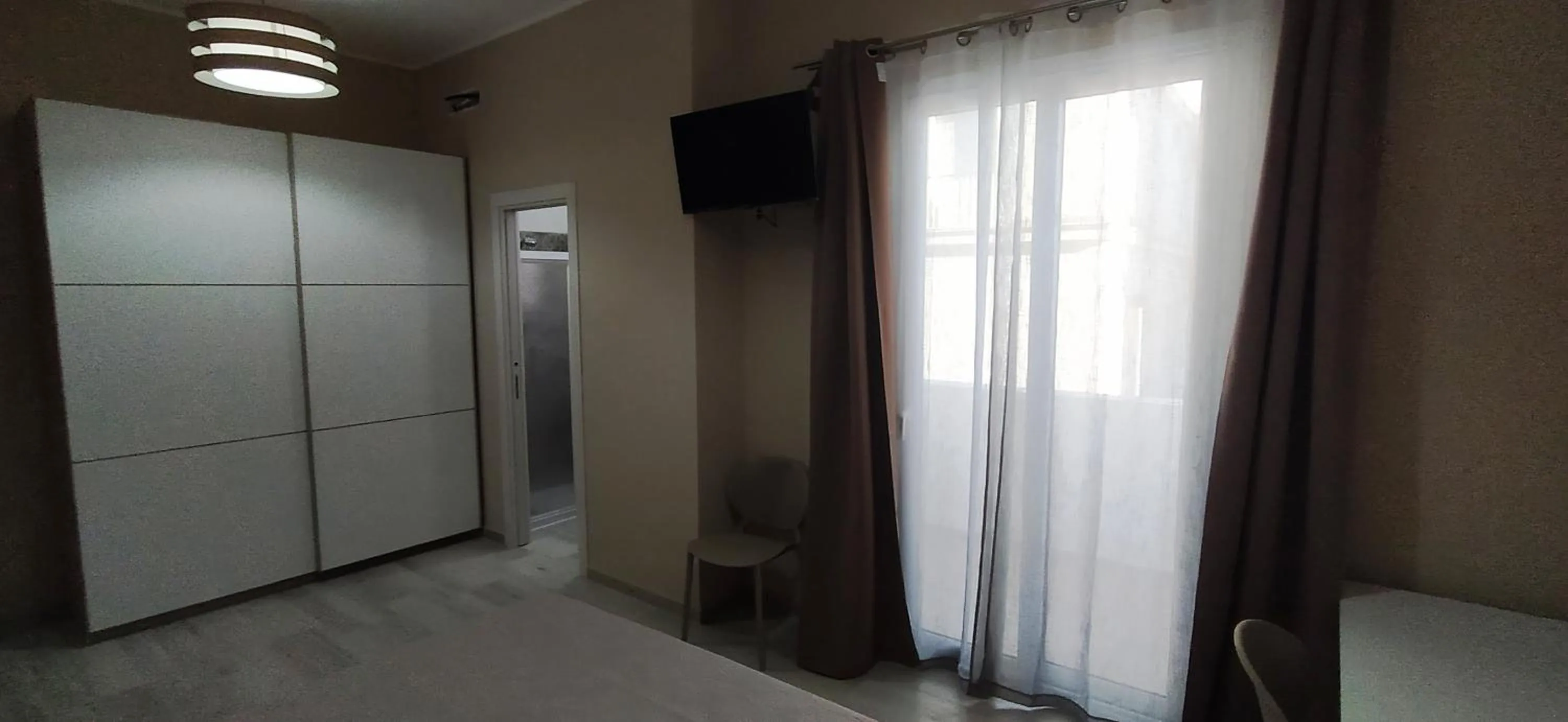 TV and multimedia, TV/Entertainment Center in Giliberto Rooms