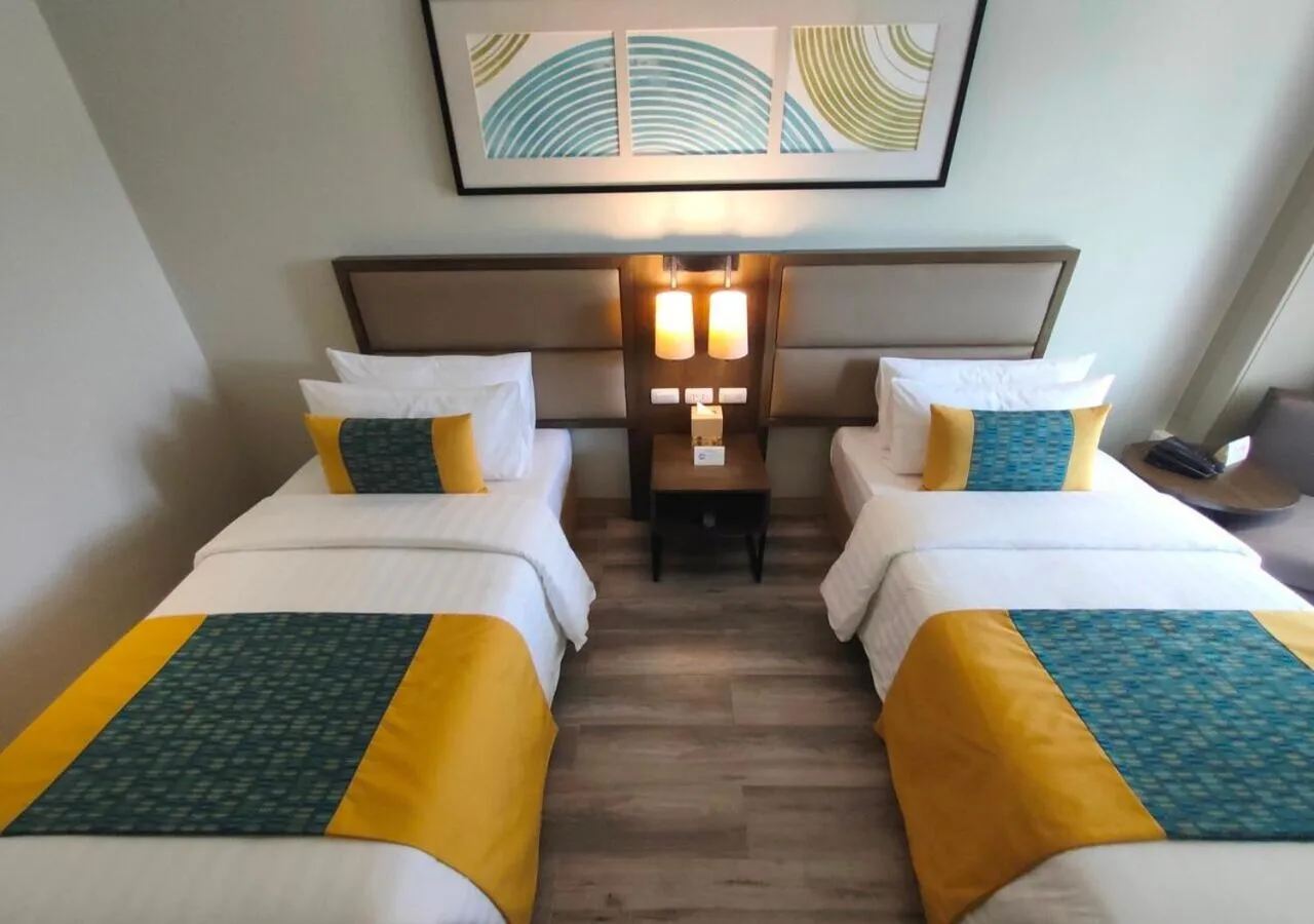 Photo of the whole room, Bed in Belmont Hotel Boracay near Newcoast Beach