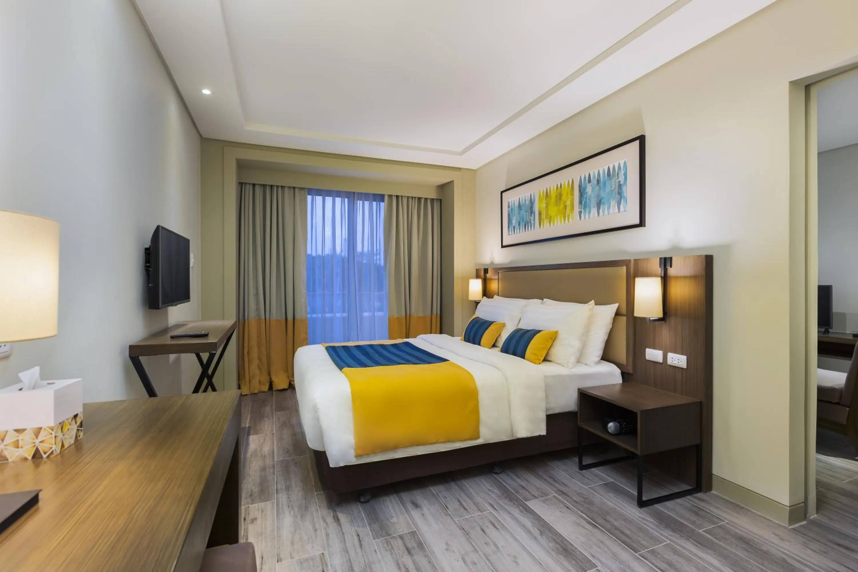 Photo of the whole room, Bed in Belmont Hotel Boracay near Newcoast Beach