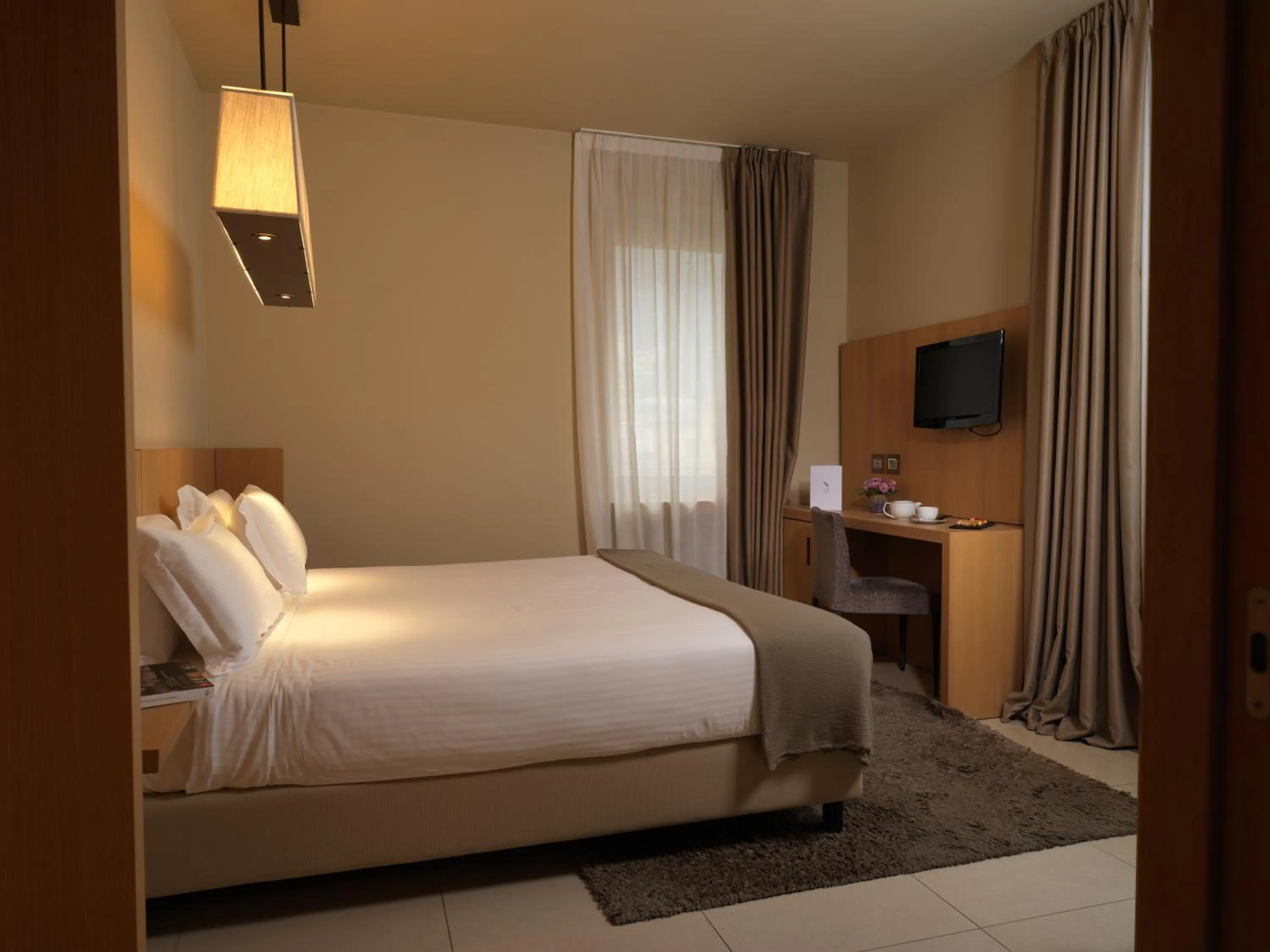 Bed in Albergo Nicolin