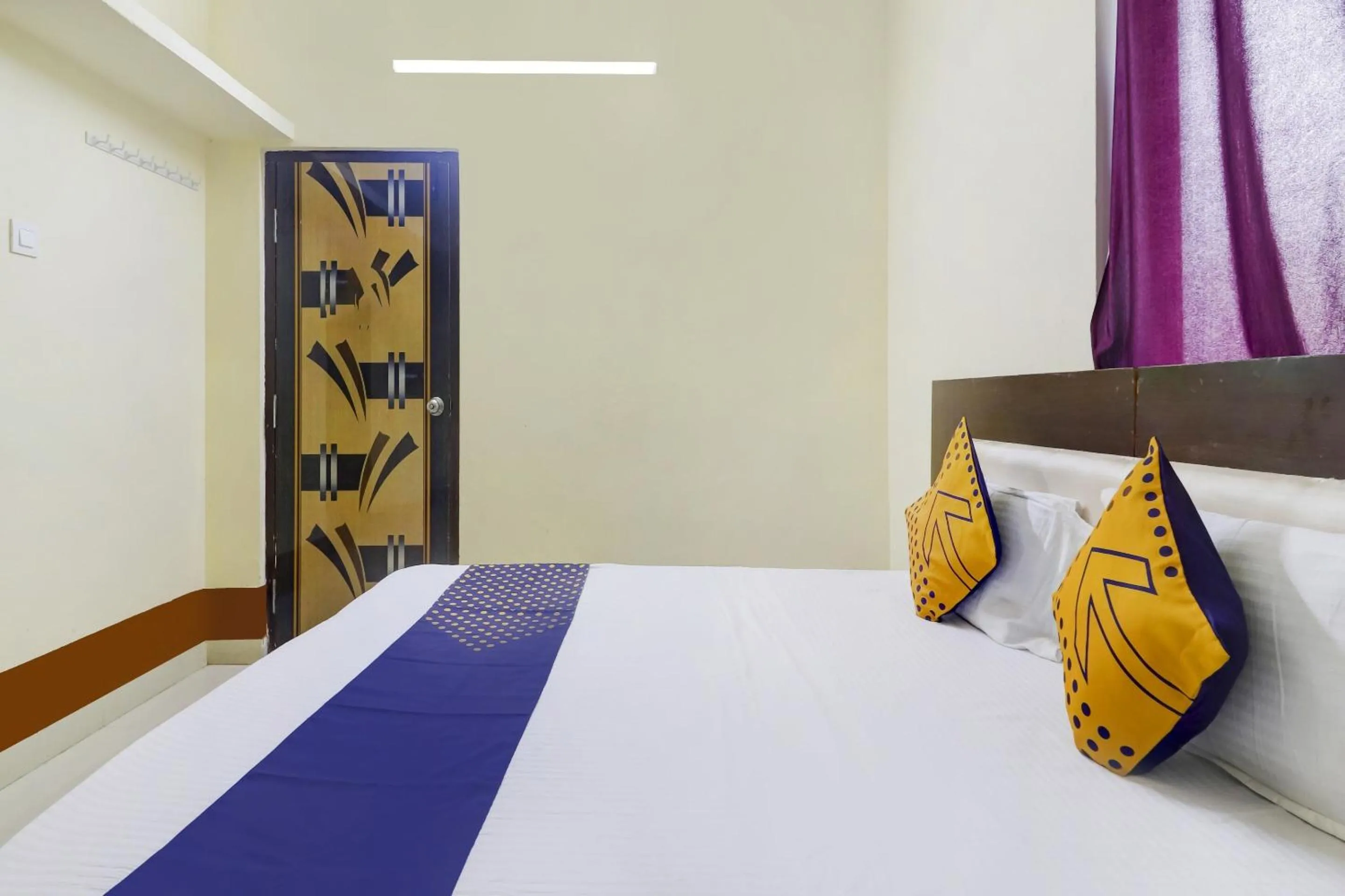 Bedroom in Hotel O Srinidhi Inn