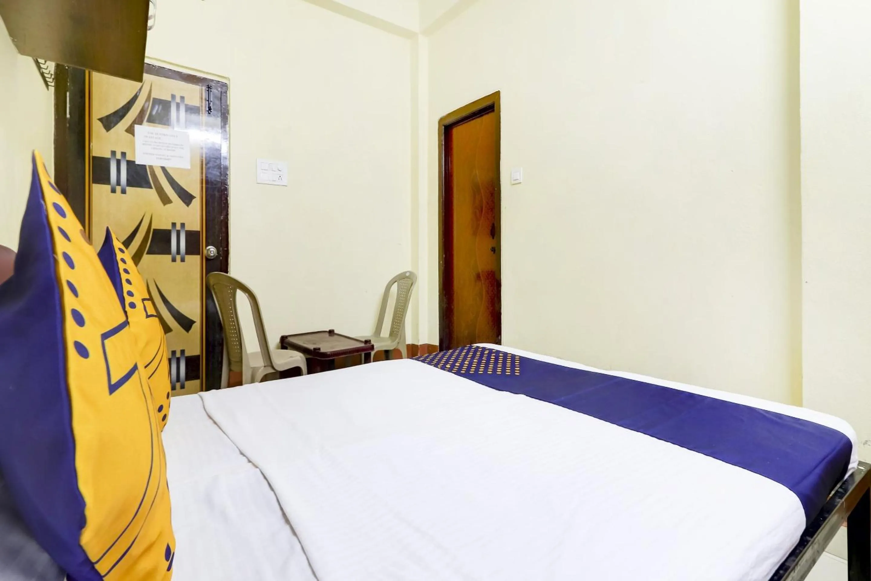 Bedroom, Bed in Hotel O Srinidhi Inn