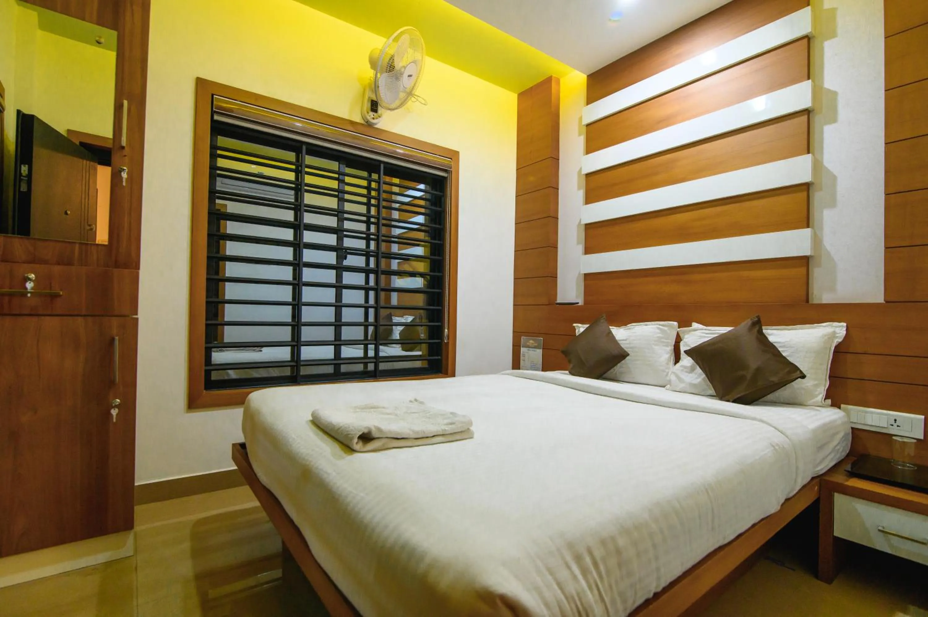 Bed in Royal Plaza Wayanad