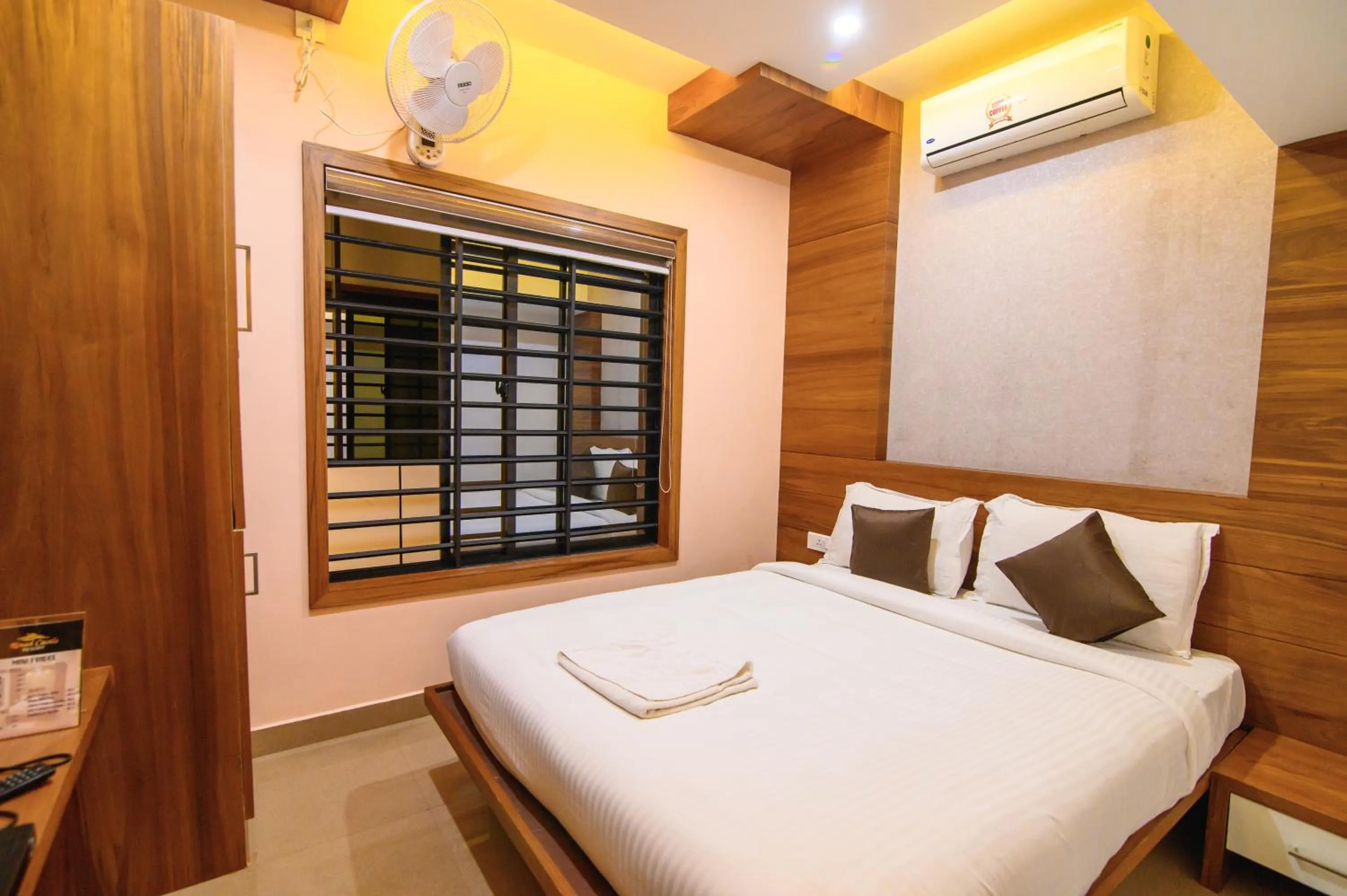 TV and multimedia, Bed in Royal Plaza Wayanad