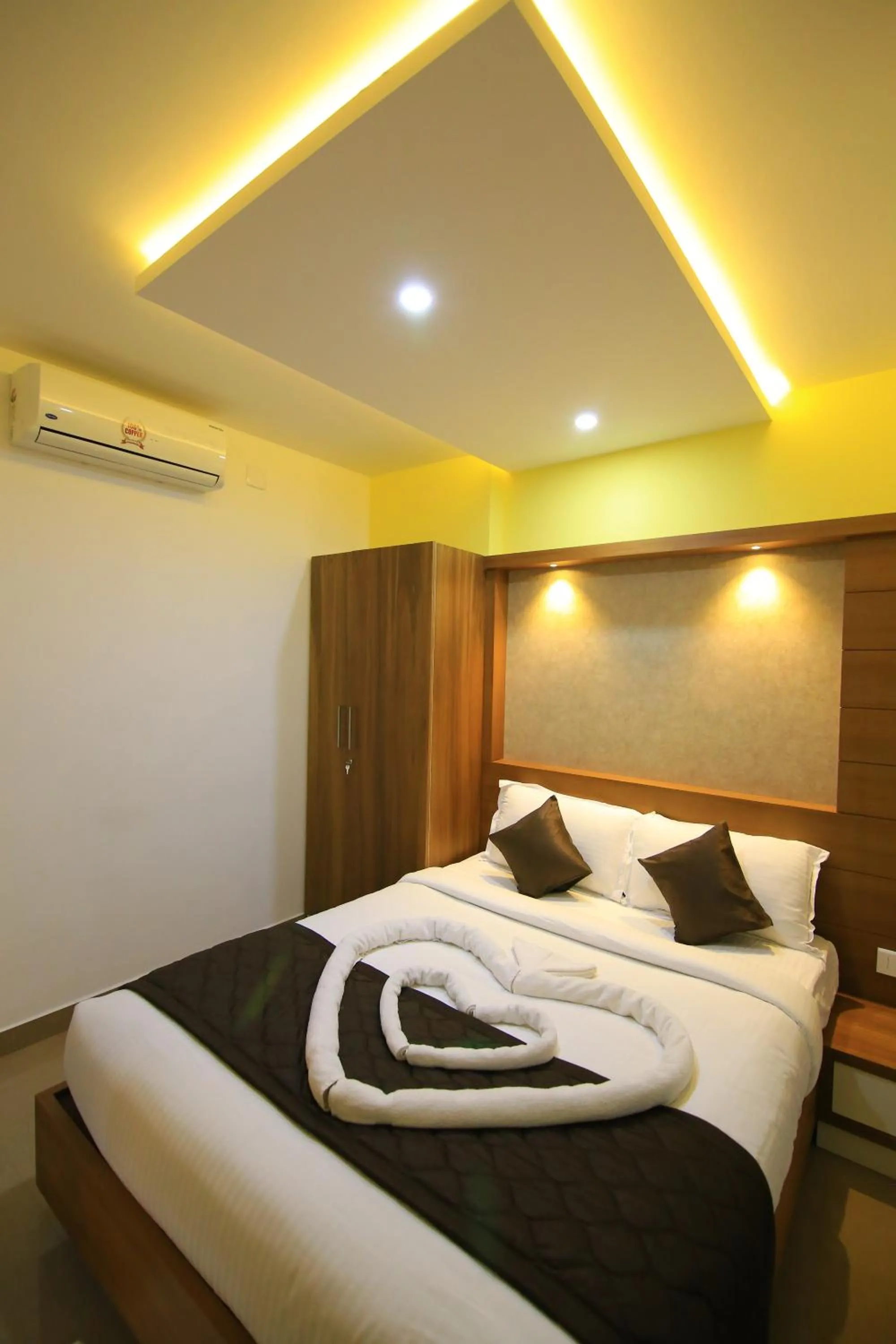 Photo of the whole room, Bed in Royal Plaza Wayanad