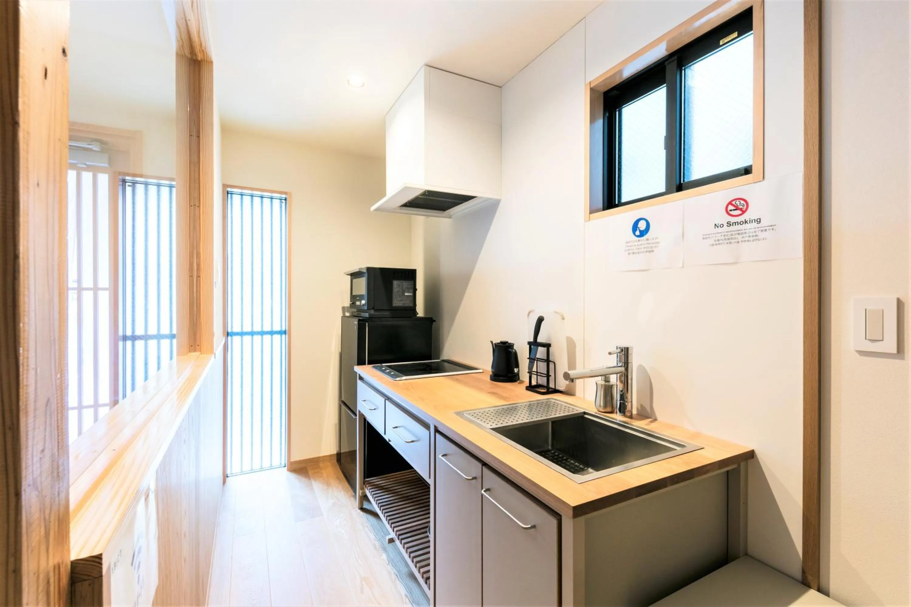 Kitchen or kitchenette in MUSUBI HOTEL MACHIYA Naraya-machi 2