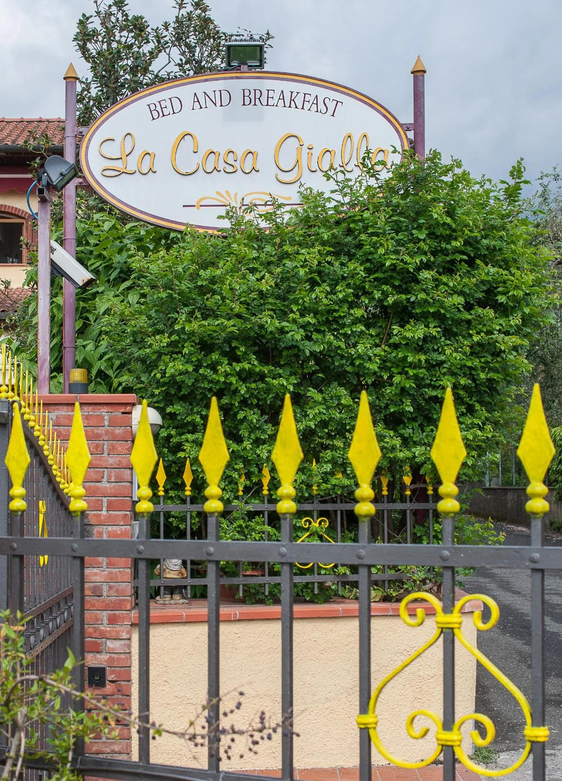 Property logo or sign in La Casa Gialla A MONTIGNOSO