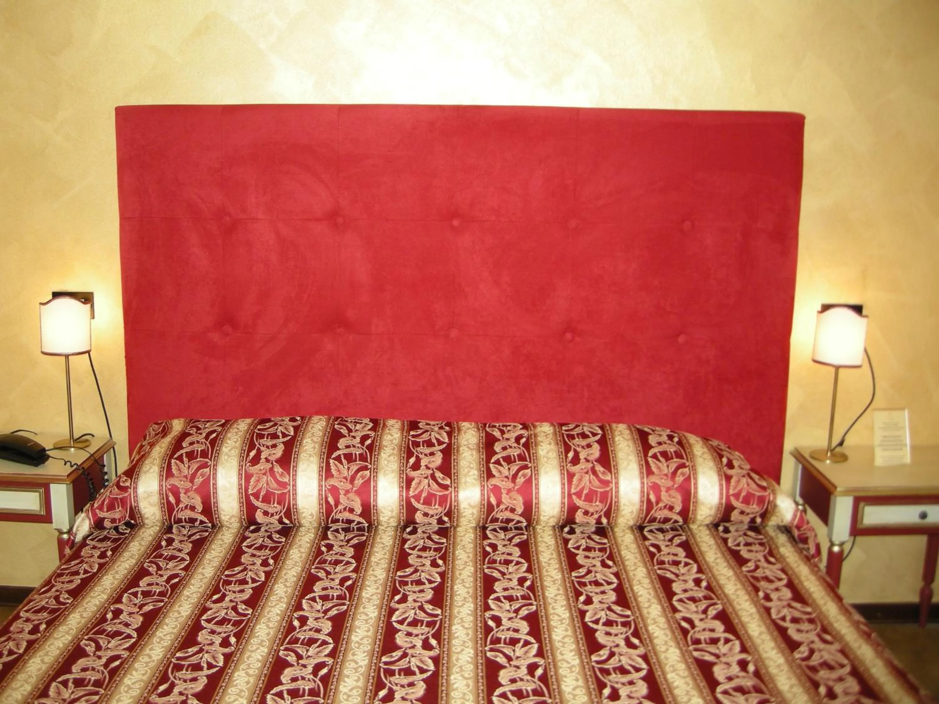 Bed in Hotel Fiordigigli