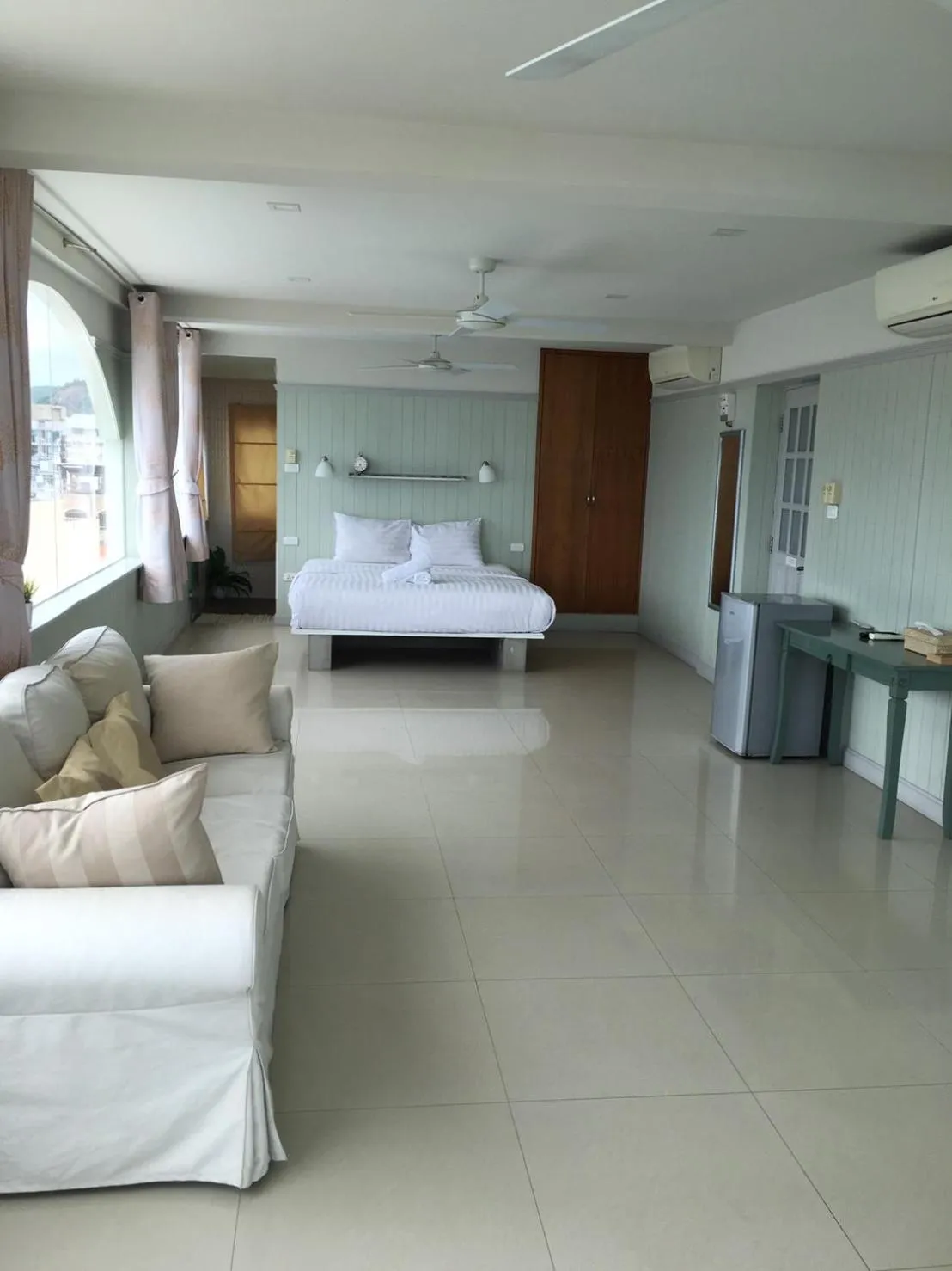 Bed in PierView Rooms