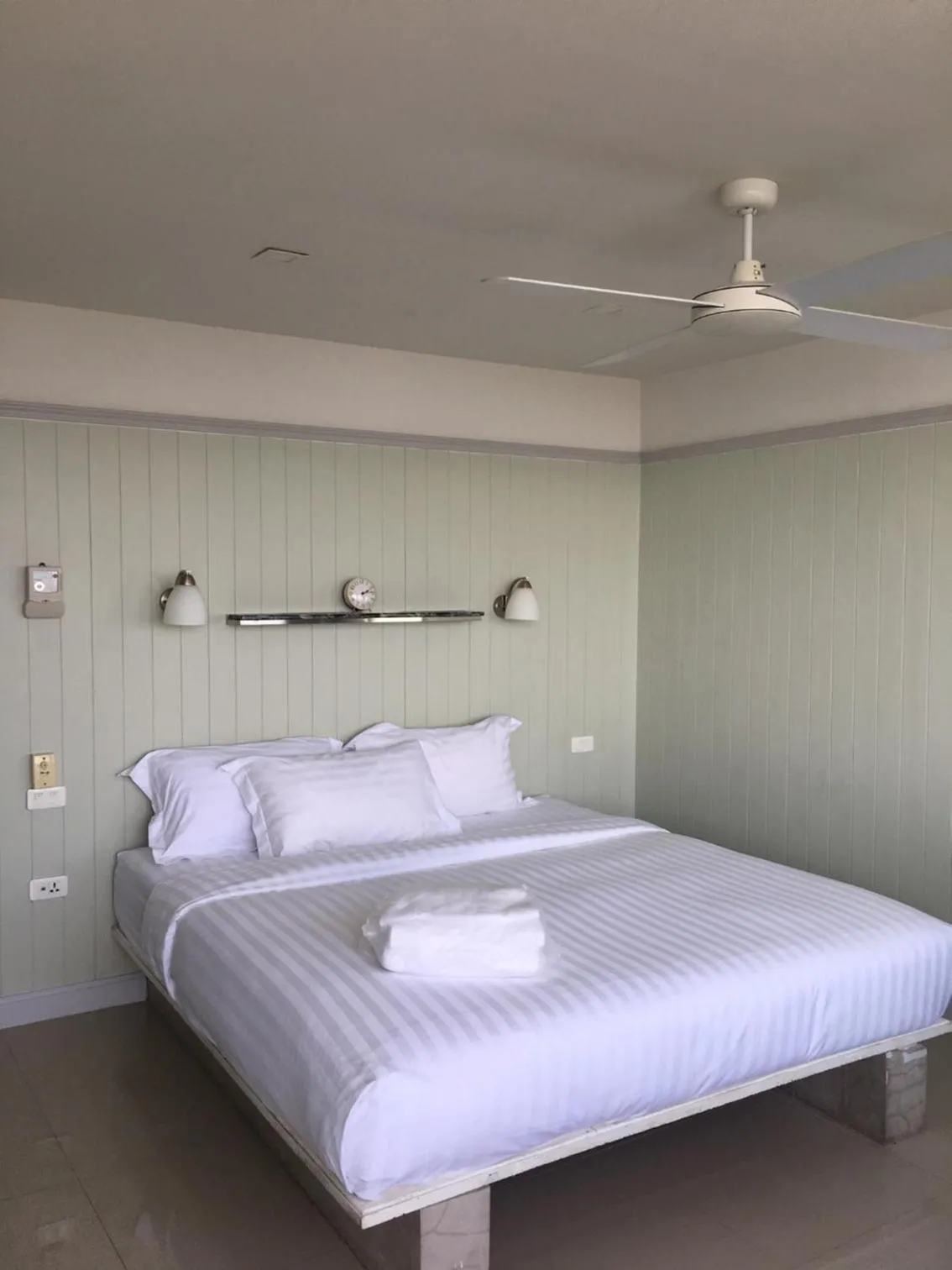 Bed in PierView Rooms