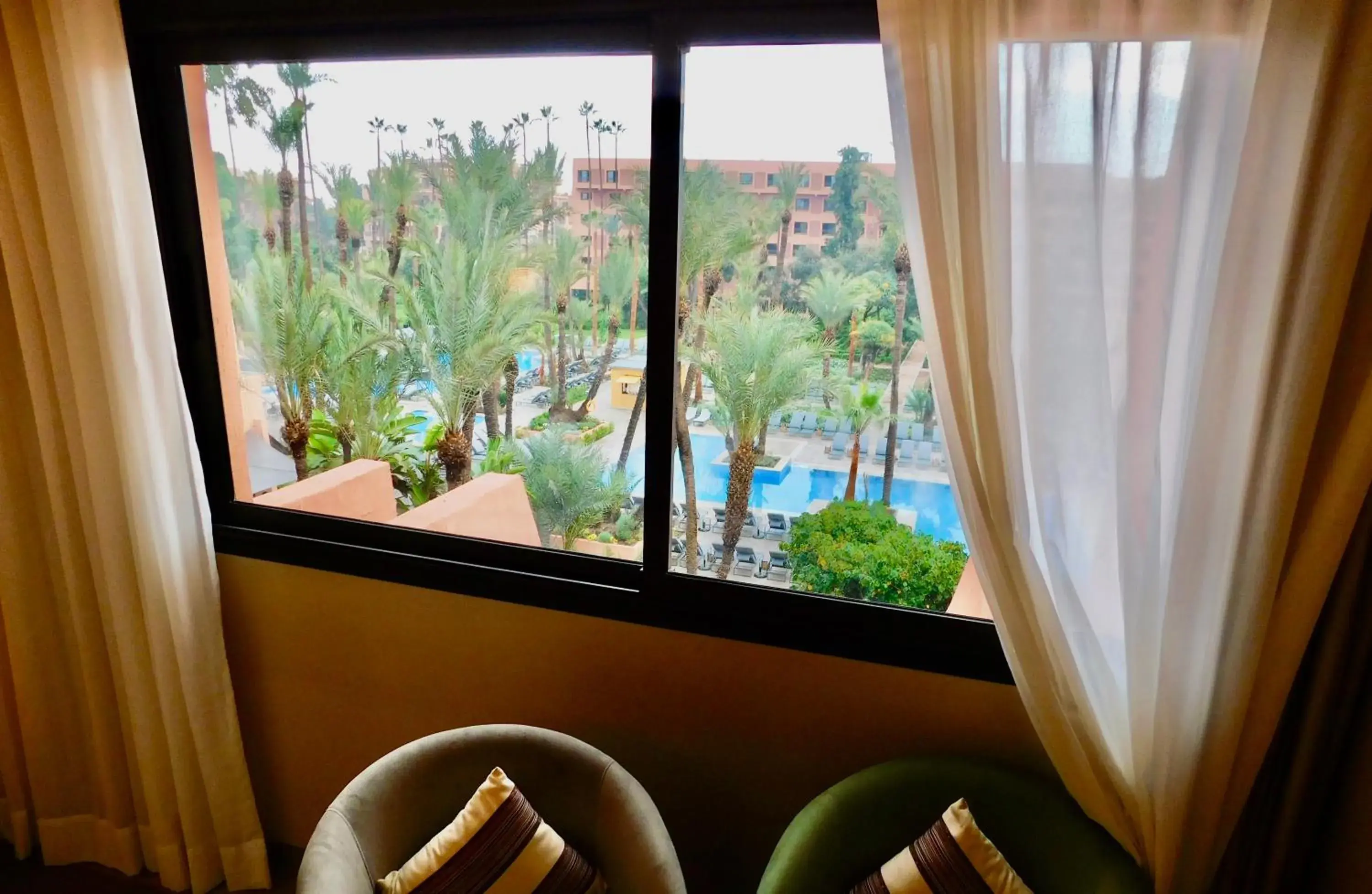 Pool view in Kenzi Rose Garden Pool view in Kenzi Rose Garden