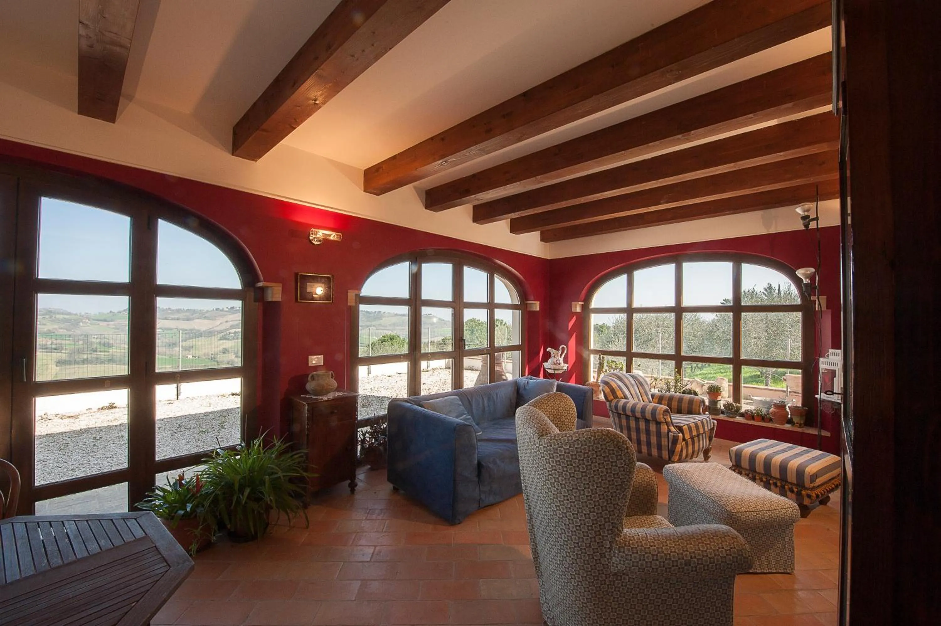 Communal lounge/ TV room in B&B Punto Magico