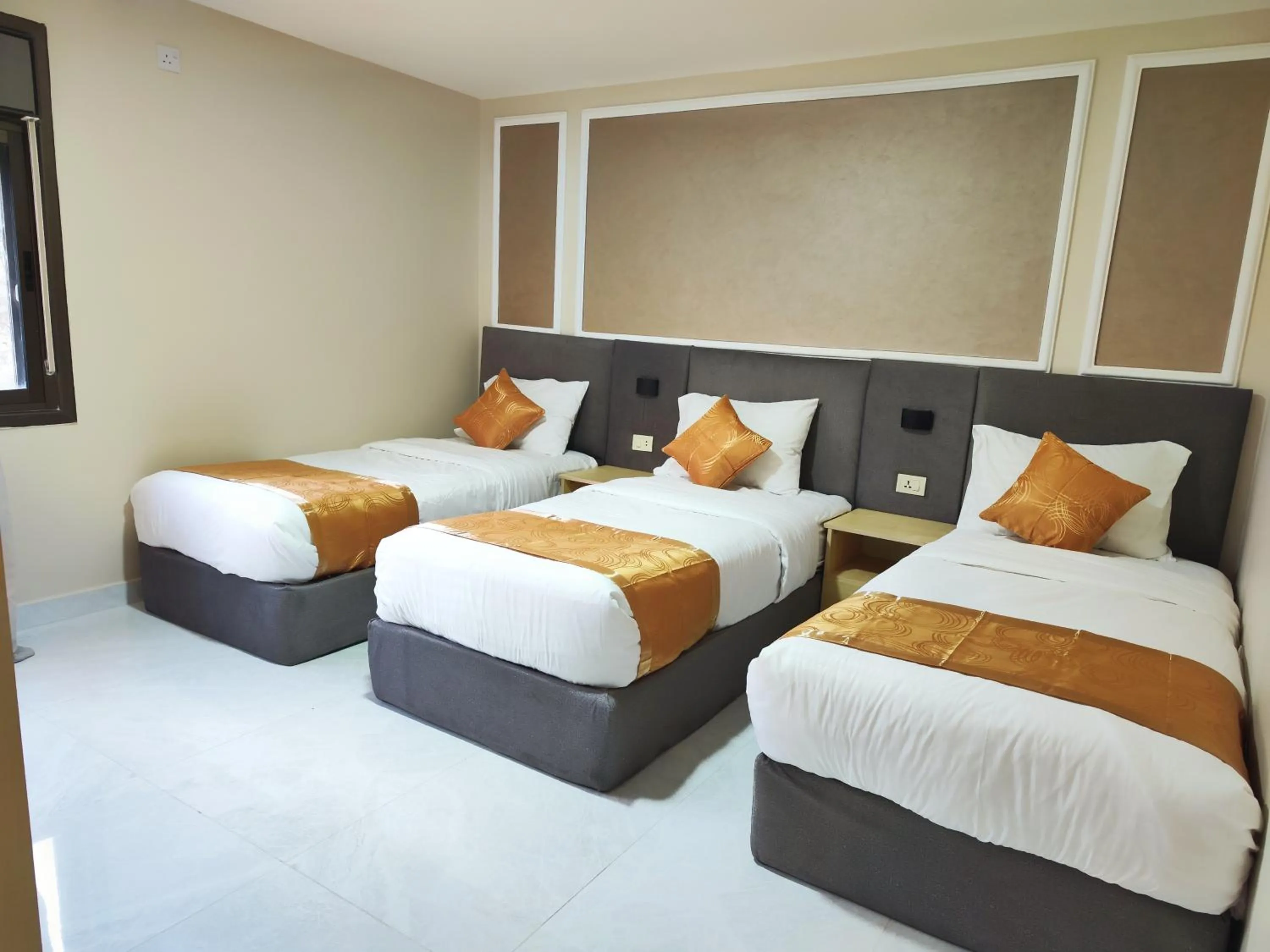 Bed in Rakan ApartHotel and Luxury Rooms