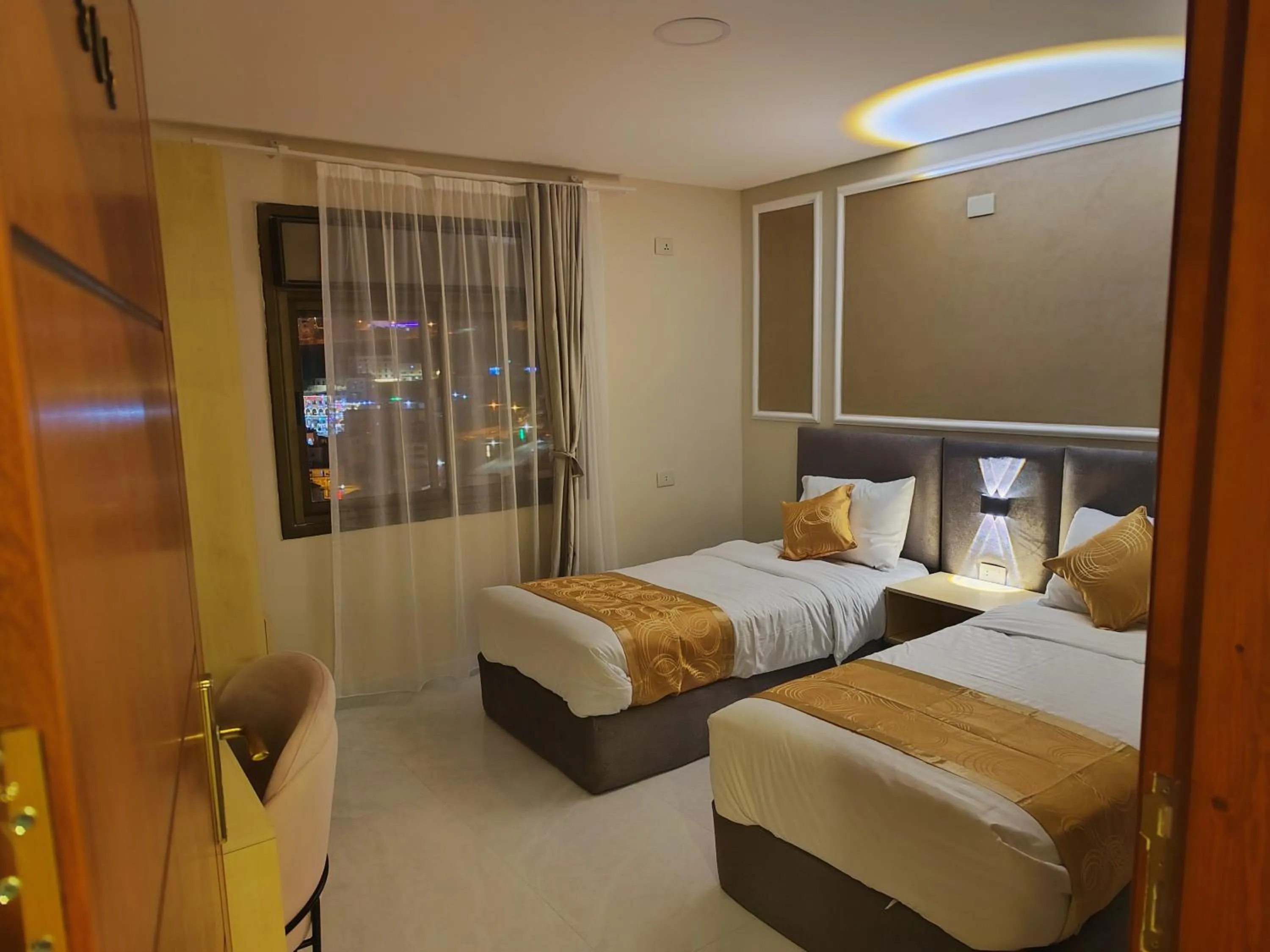 Bed in Rakan ApartHotel and Luxury Rooms