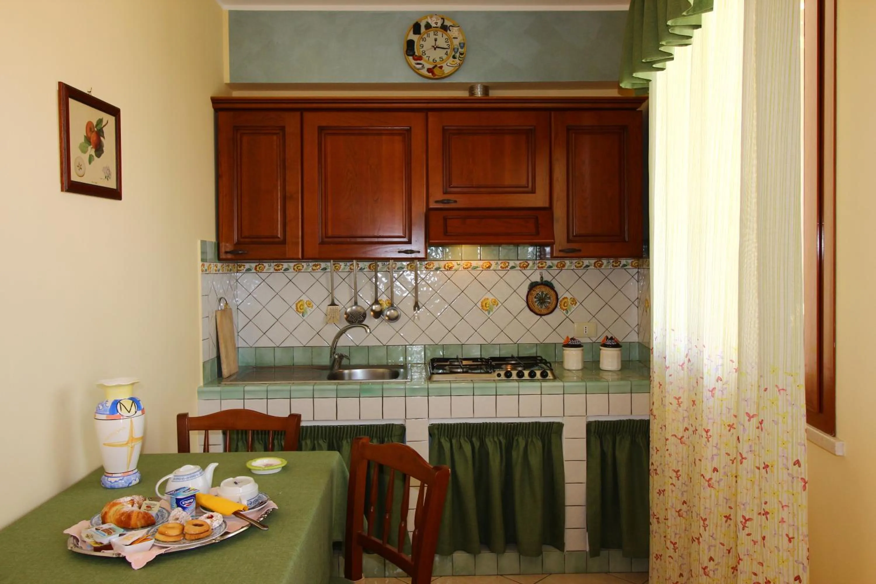 Kitchen or kitchenette in Gran Residence Marisa