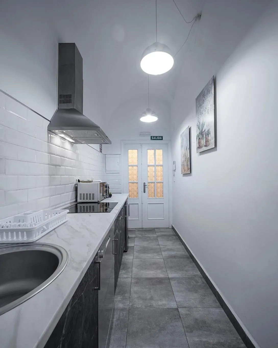 Kitchen or kitchenette in Apartamentos Gladiador