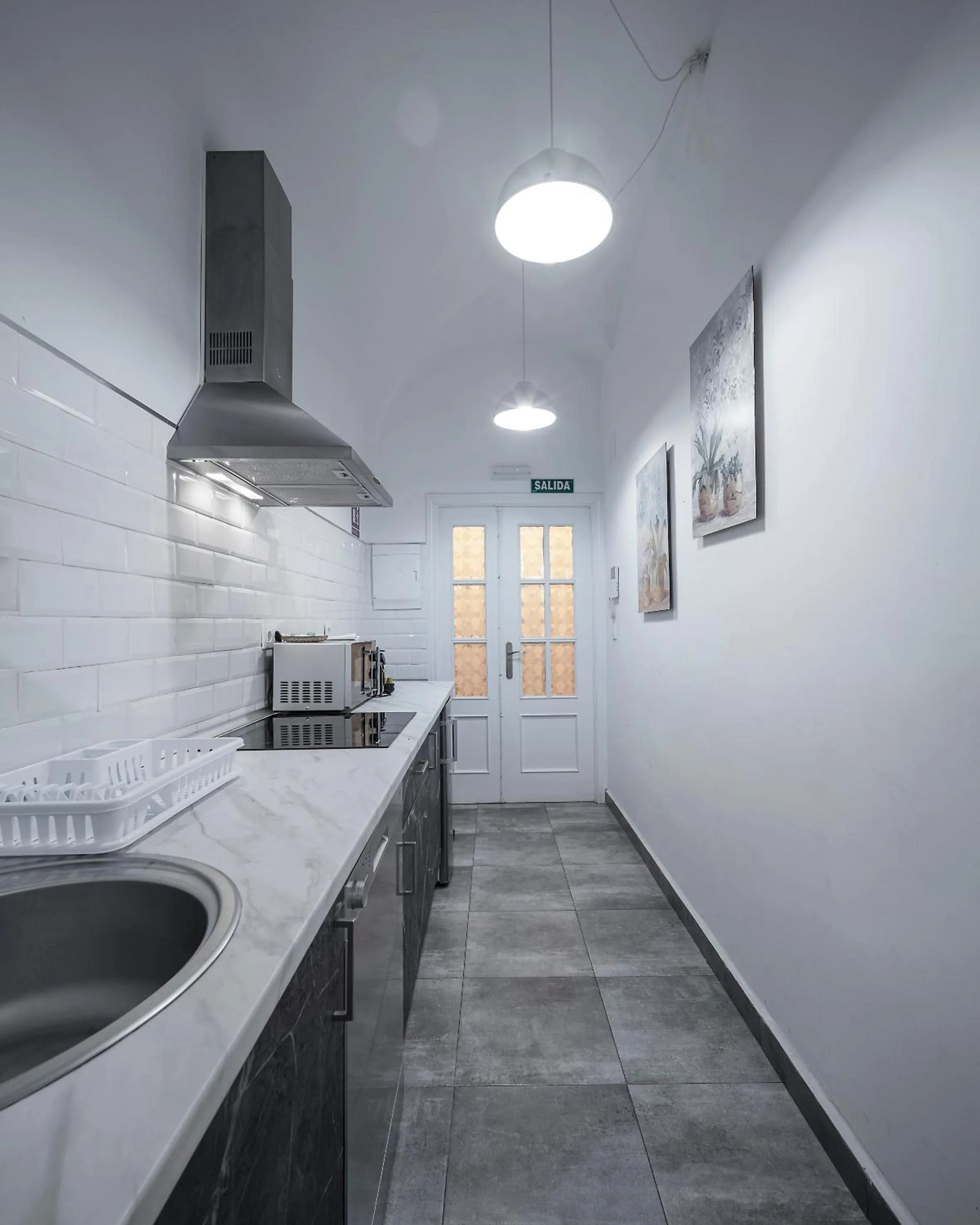 Kitchen or kitchenette in Apartamentos Gladiador