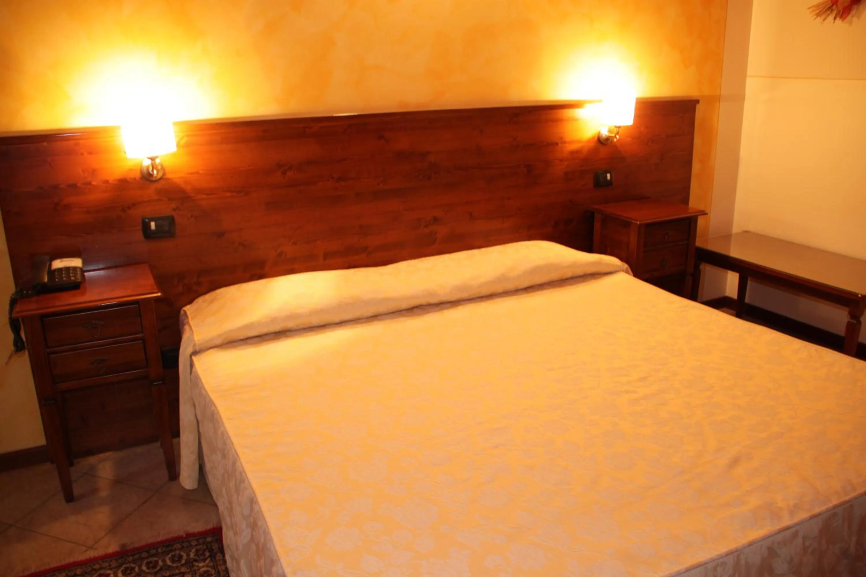 Bed in Albergo La Piana