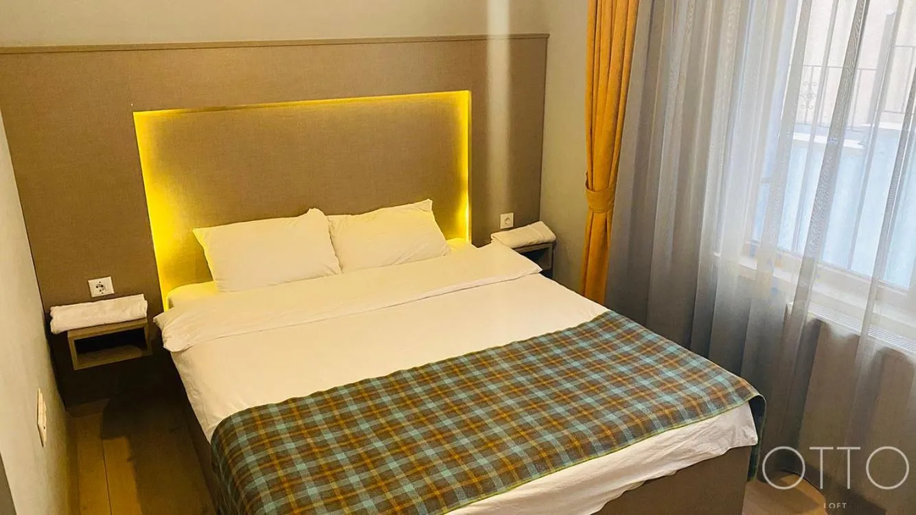 Bed in OTTO LOFT Premium Apartments