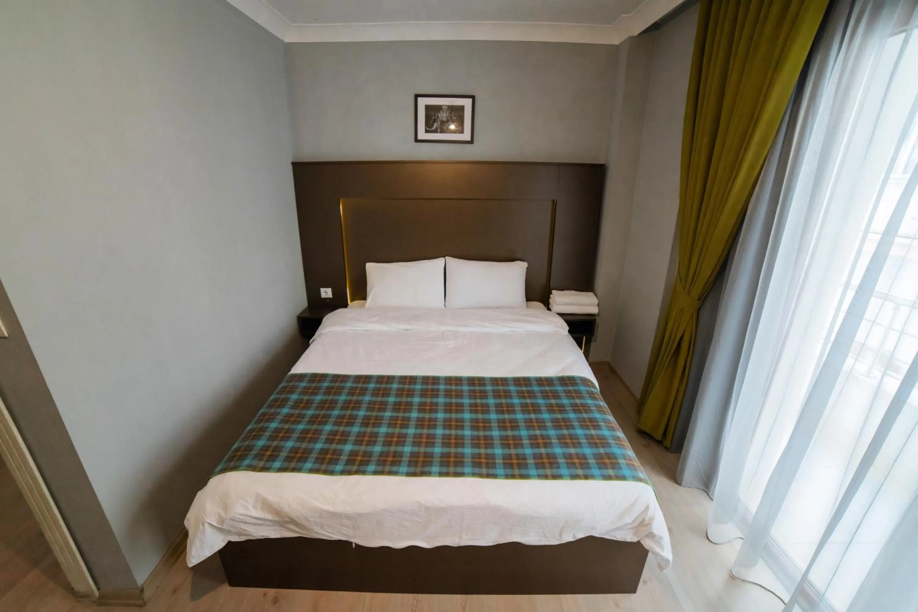 Bed in OTTO LOFT Premium Apartments