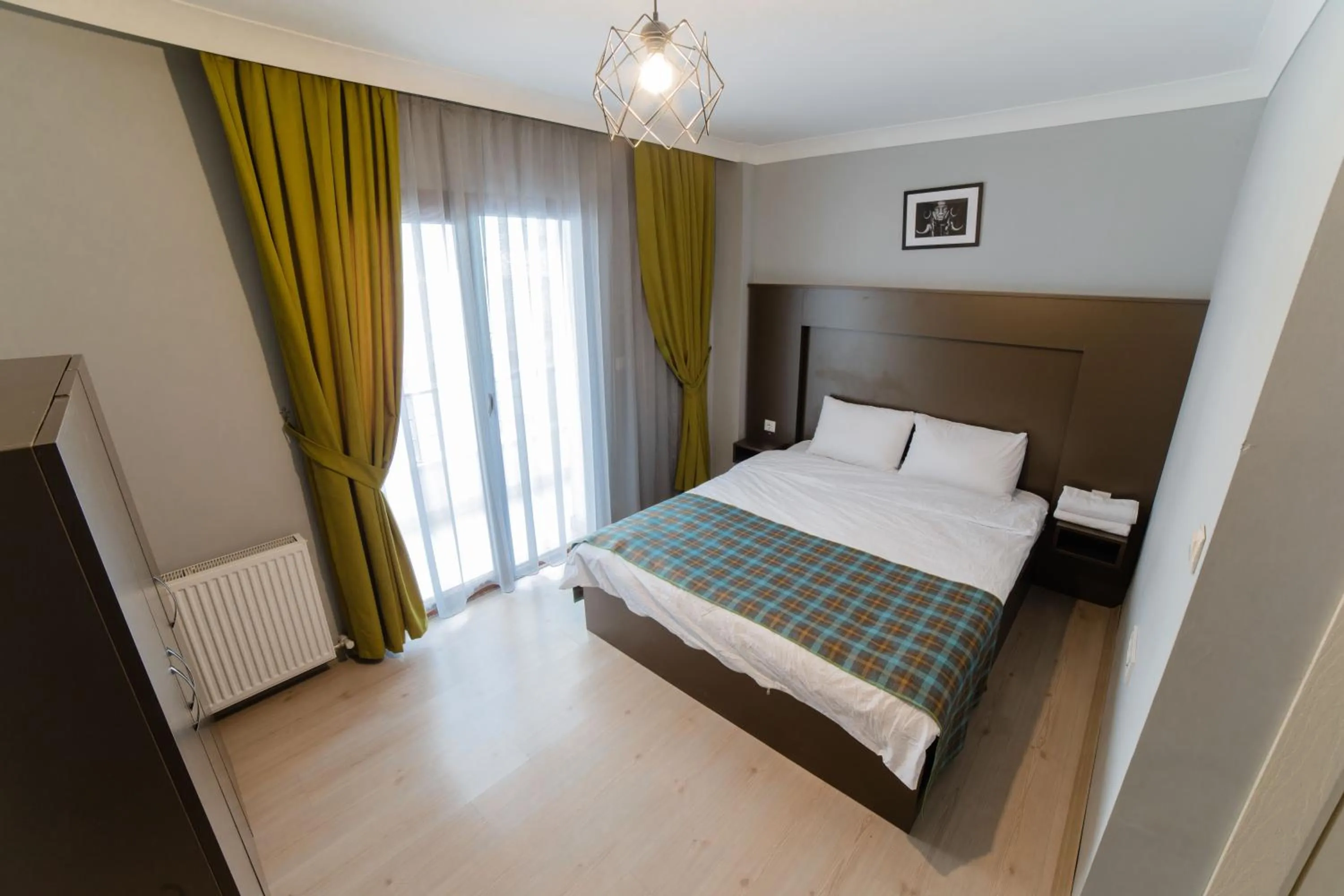 Bed in OTTO LOFT Premium Apartments