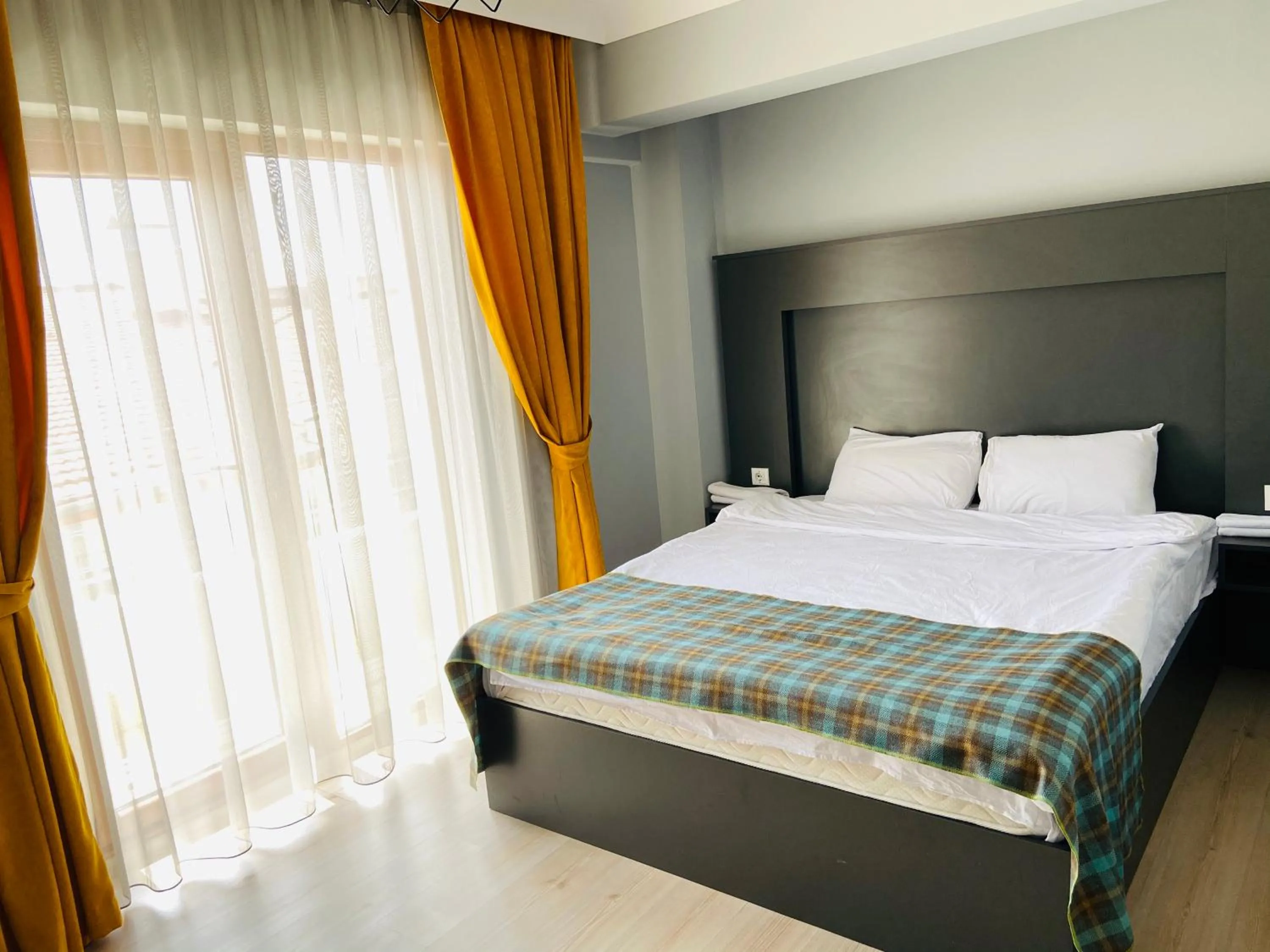 Bed in OTTO LOFT Premium Apartments