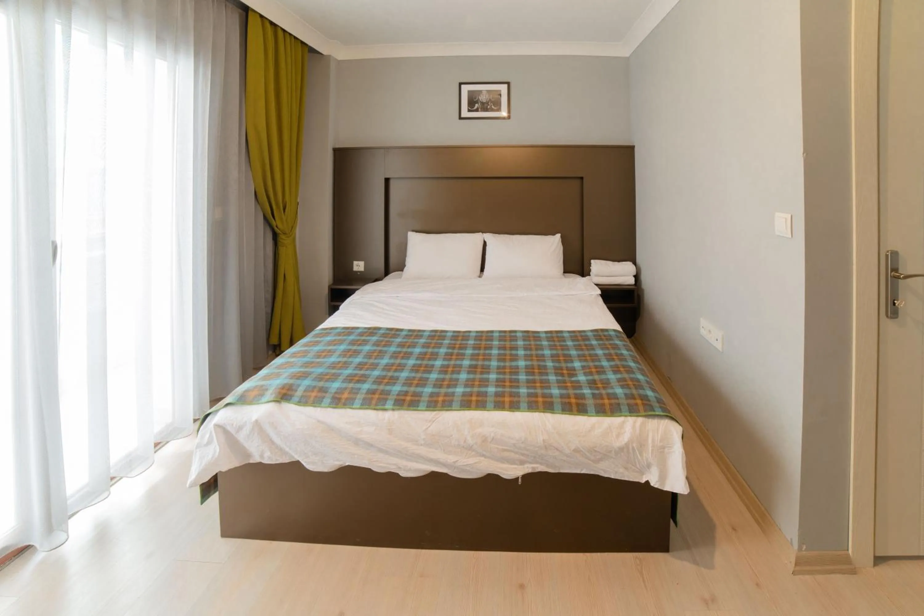 Bed in OTTO LOFT Premium Apartments