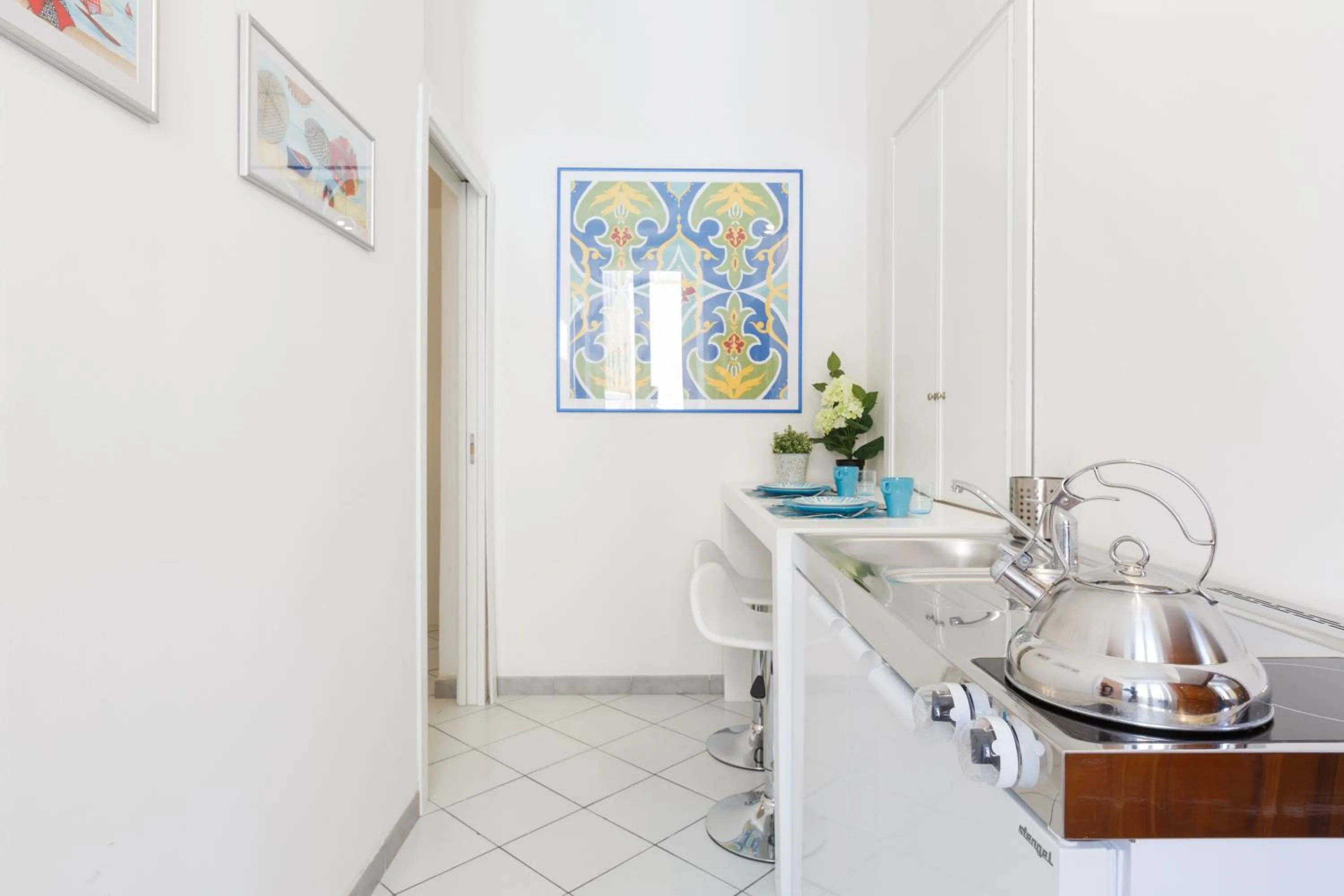 Communal kitchen in B&B Piazza Fratti