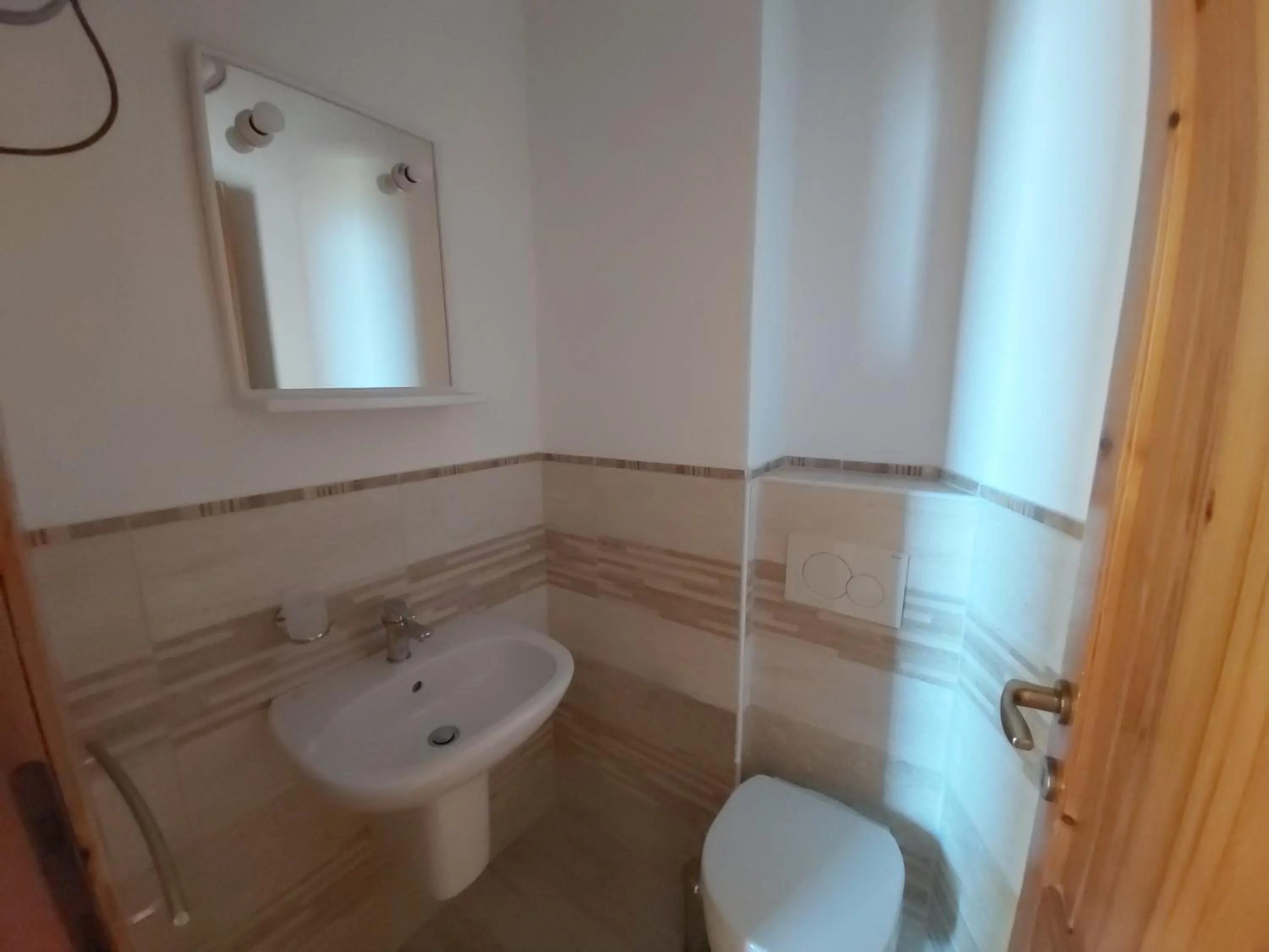Bathroom in Residence Baia Santa Reparata