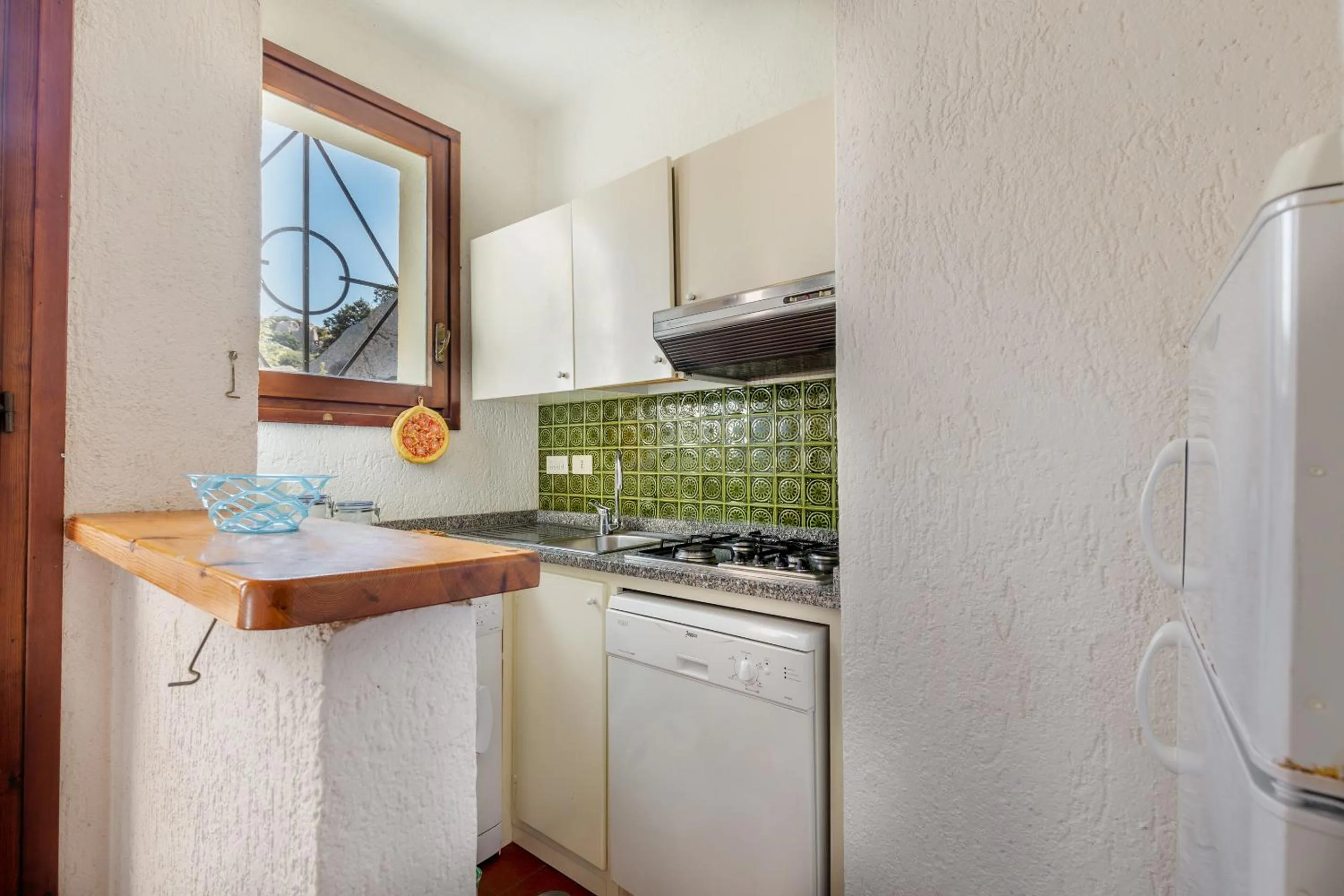 Kitchen or kitchenette in Residence Baia Santa Reparata