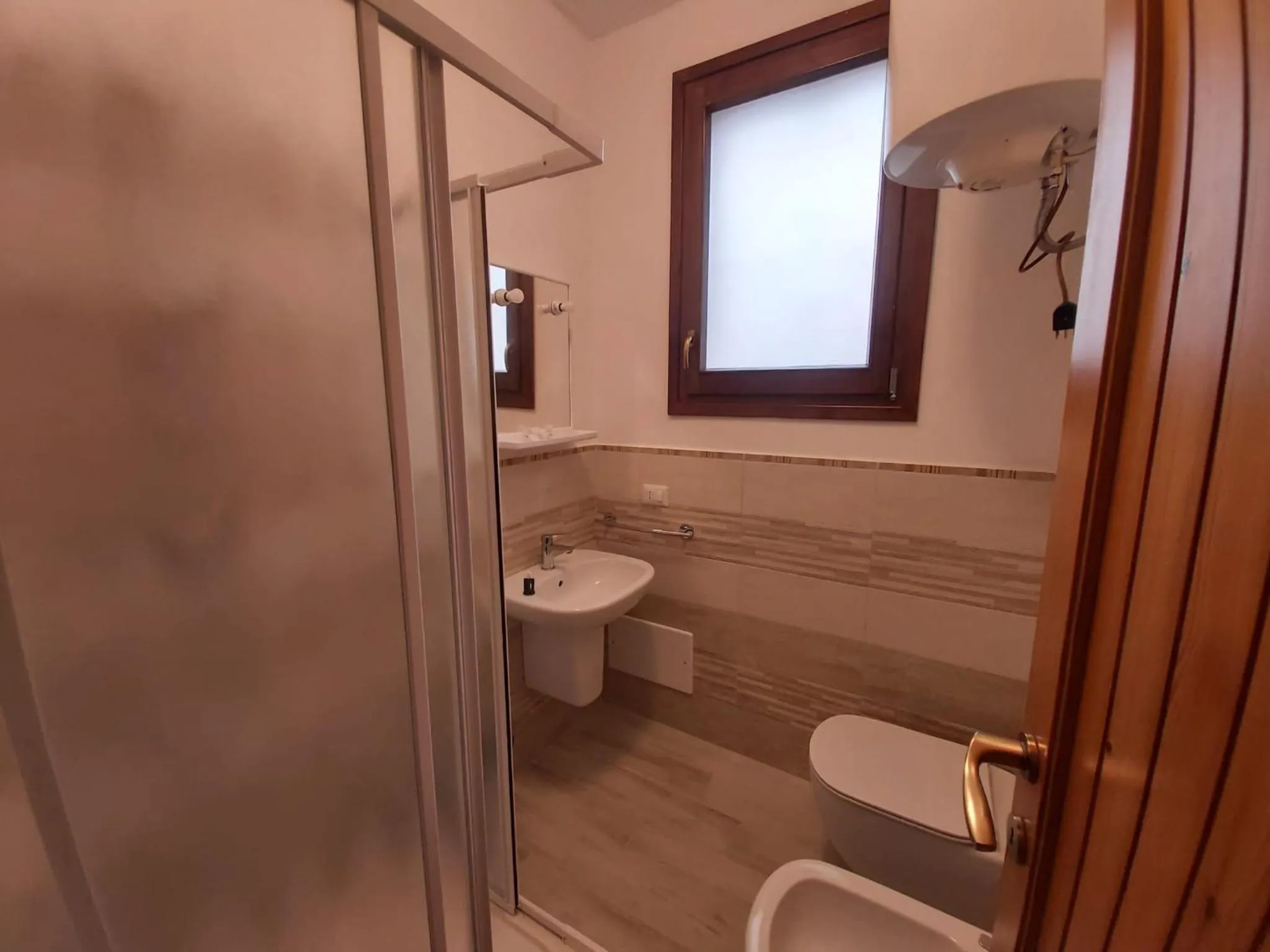 Bathroom in Residence Baia Santa Reparata