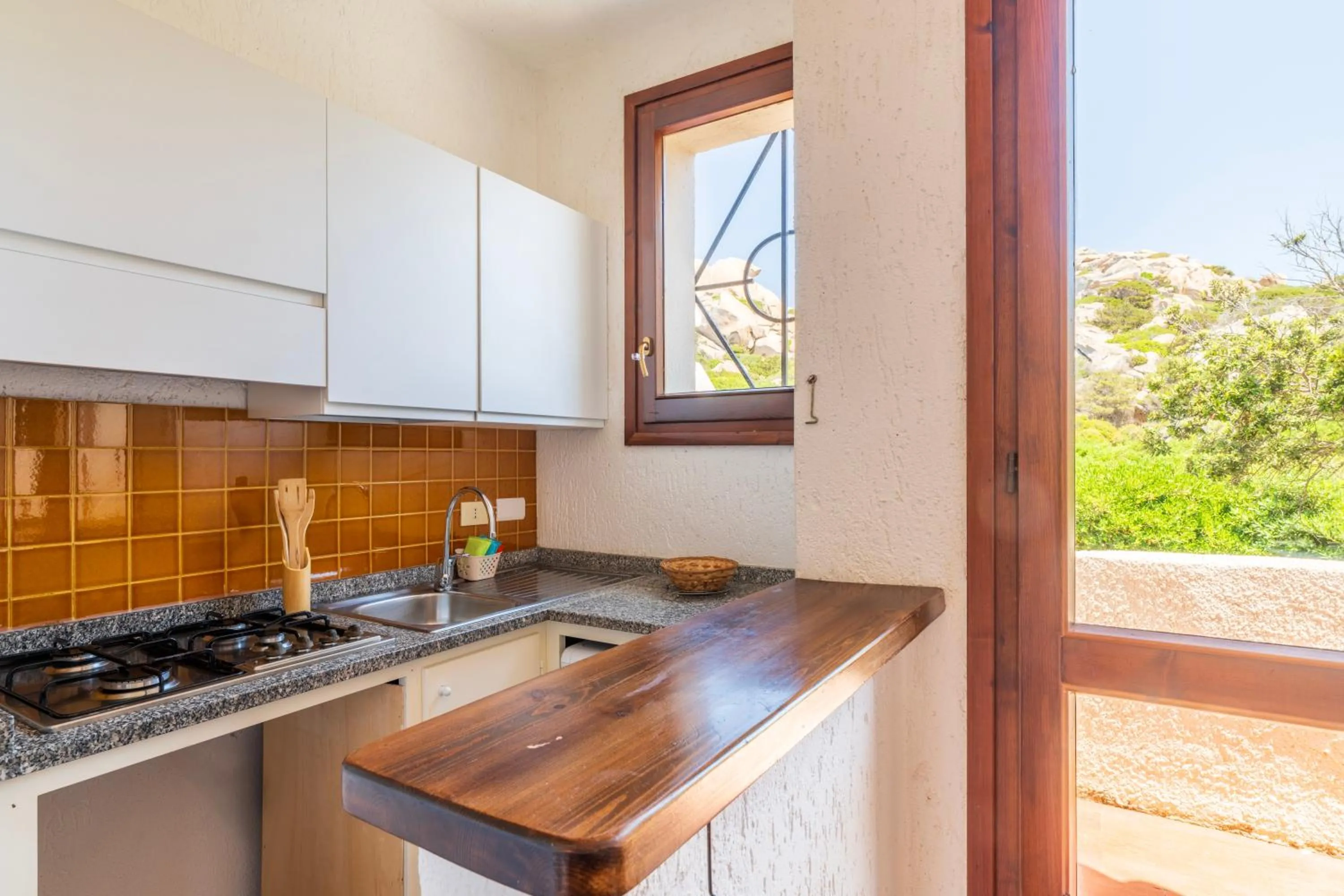 Kitchen or kitchenette in Residence Baia Santa Reparata