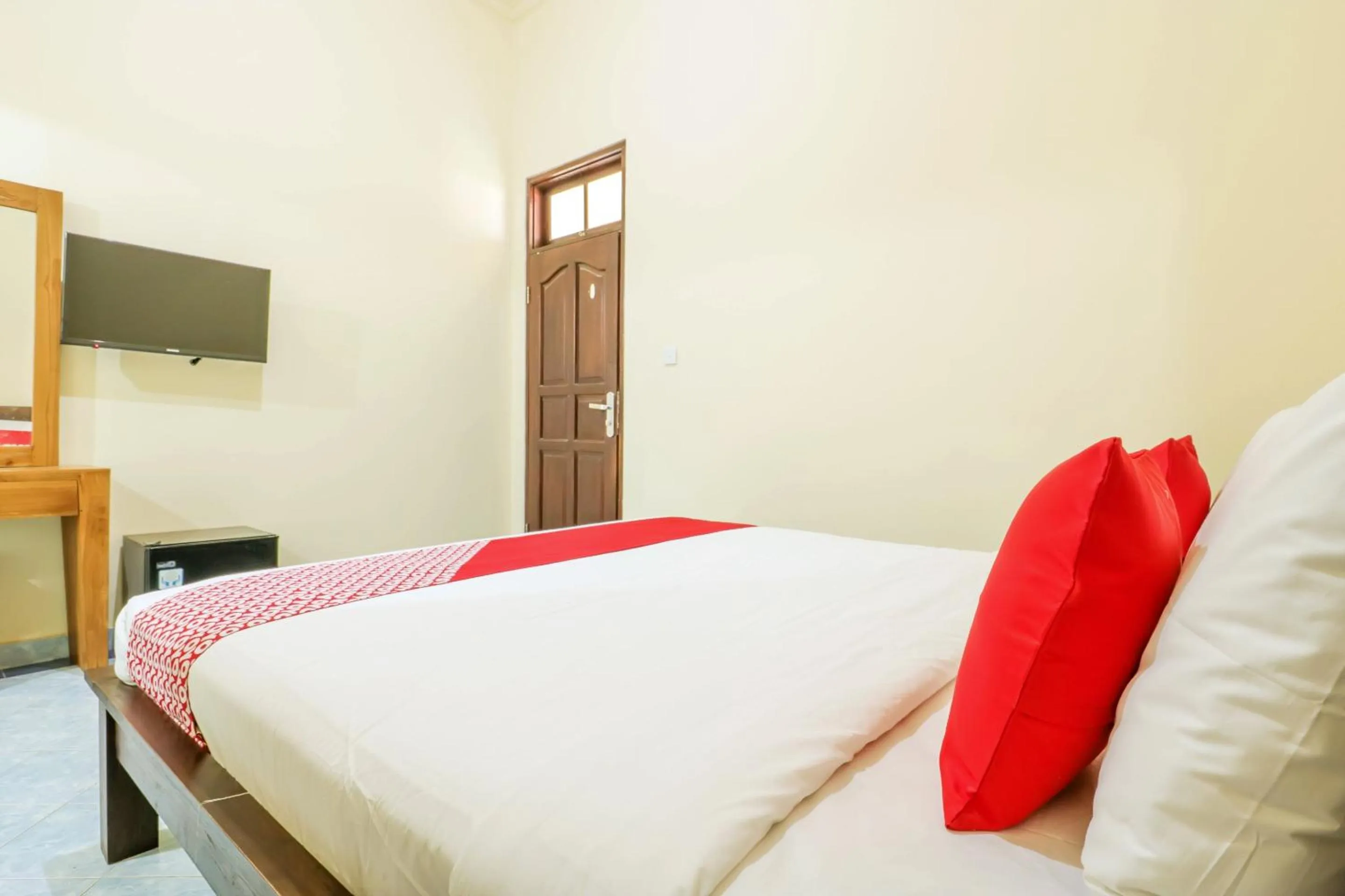 Bedroom in OYO 1684 Marina Suite Apartment Bali